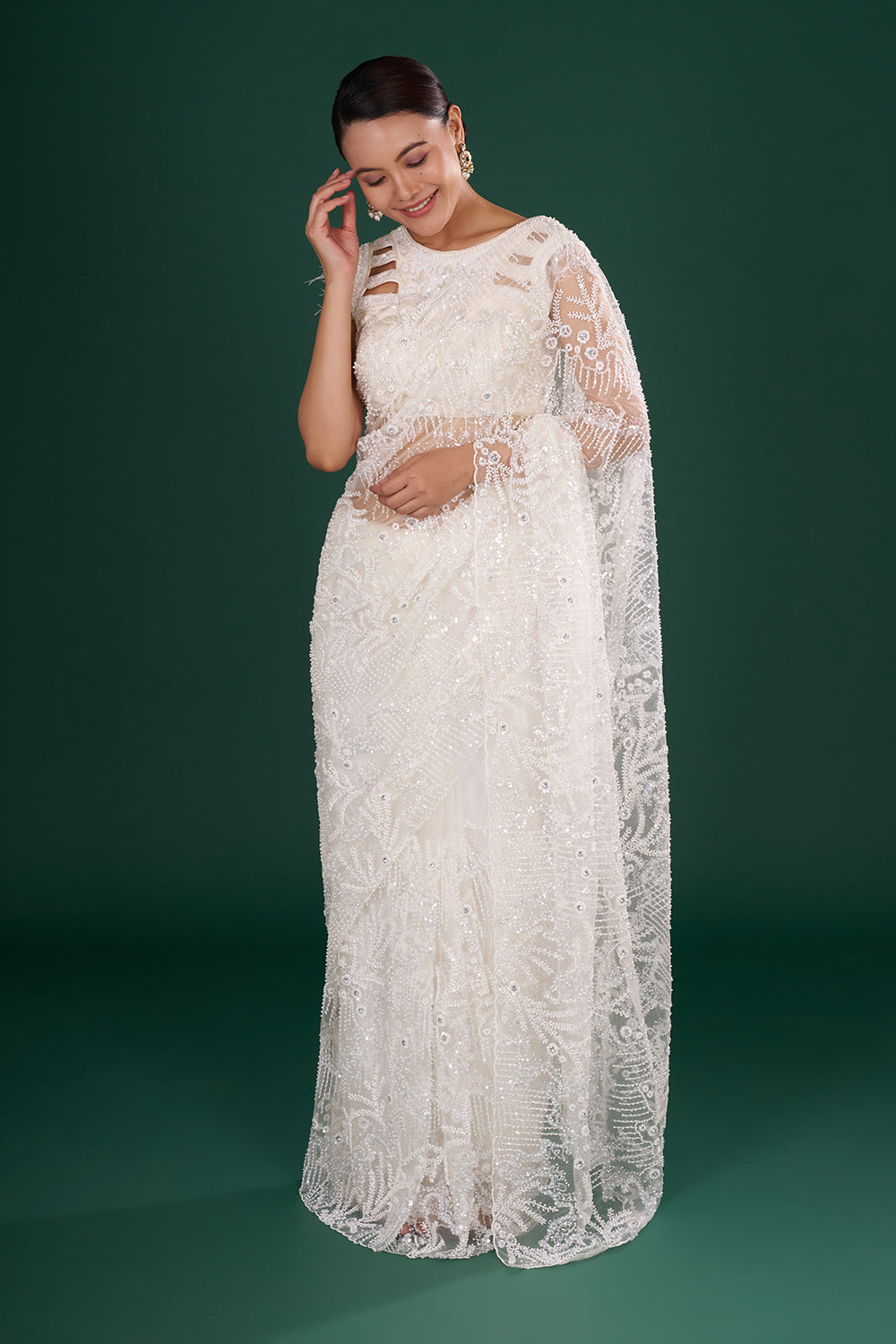 Off-White Net Saree in Abstract Pattern with Cutdana Embroidery