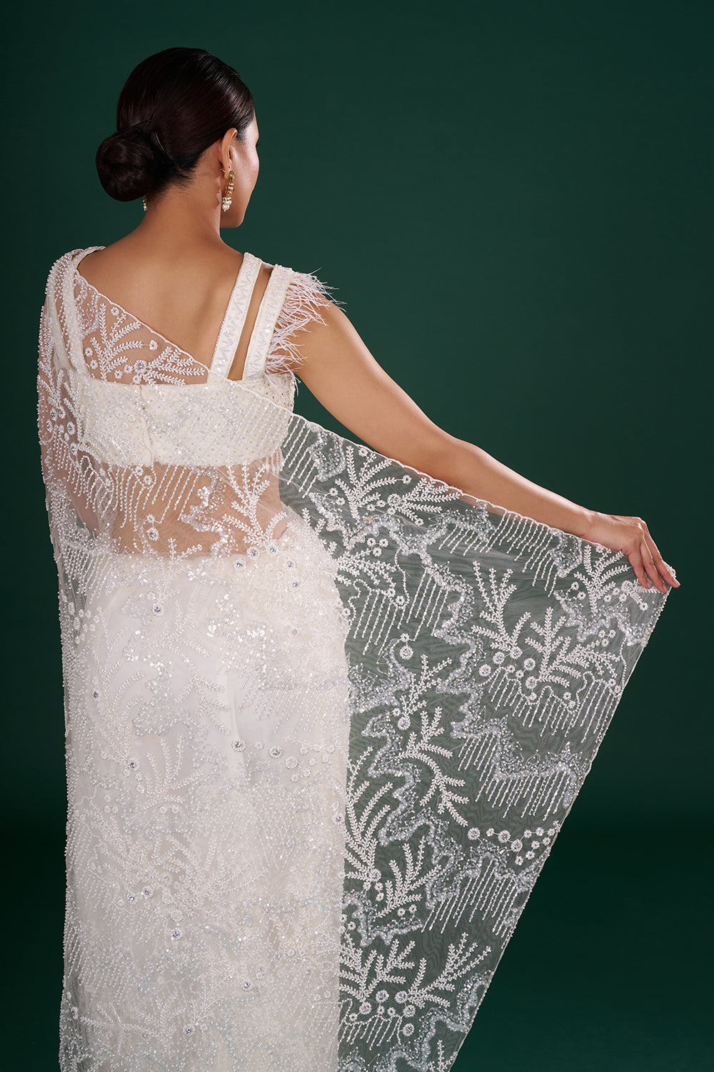 Off-White Net Saree in Abstract Pattern with Cutdana Embroidery