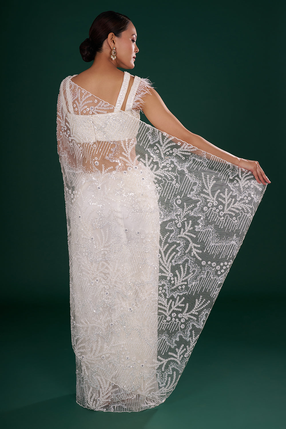 Off-White Net Saree in Abstract Pattern with Cutdana Embroidery
