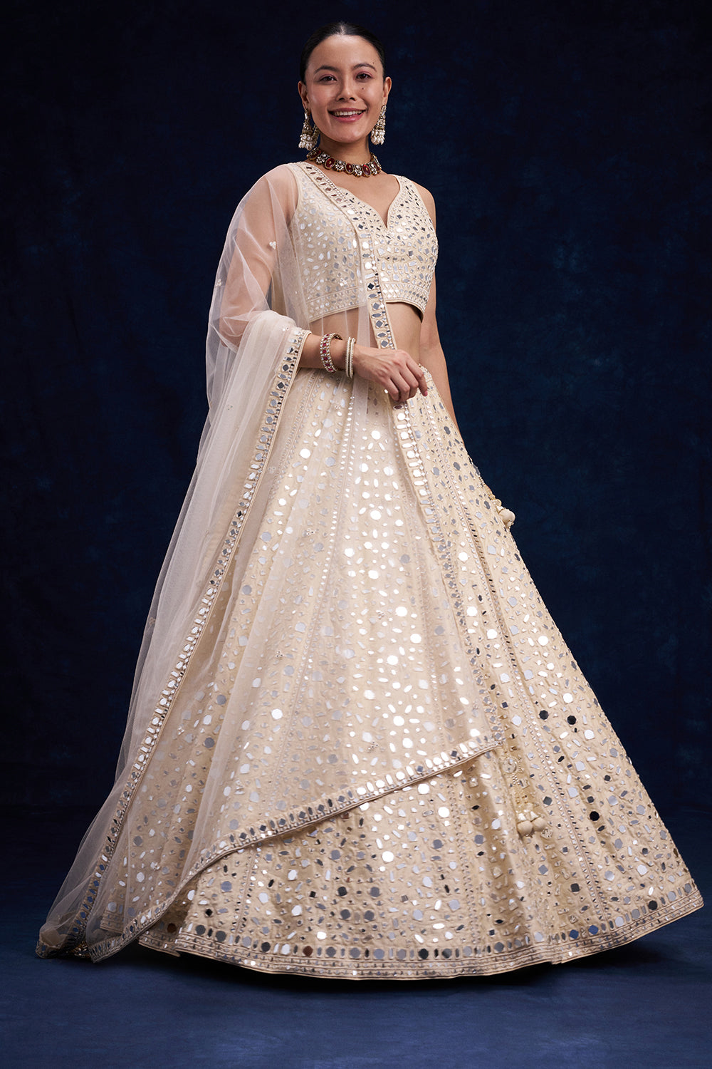 Off-White Raw Silk Bridal Lehenga with Mirror and Resham Work