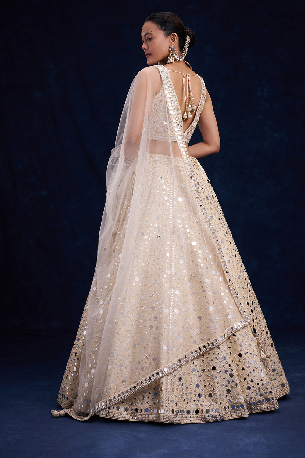 Off-White Raw Silk Bridal Lehenga with Mirror and Resham Work