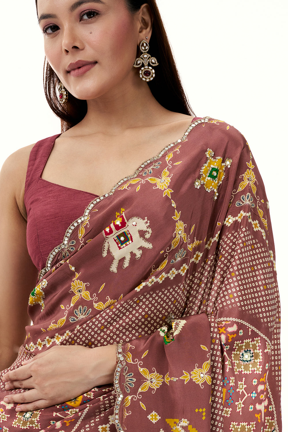 Old Rose Pink Crepe Bandhani and Patola Printed Saree with Mirror Work