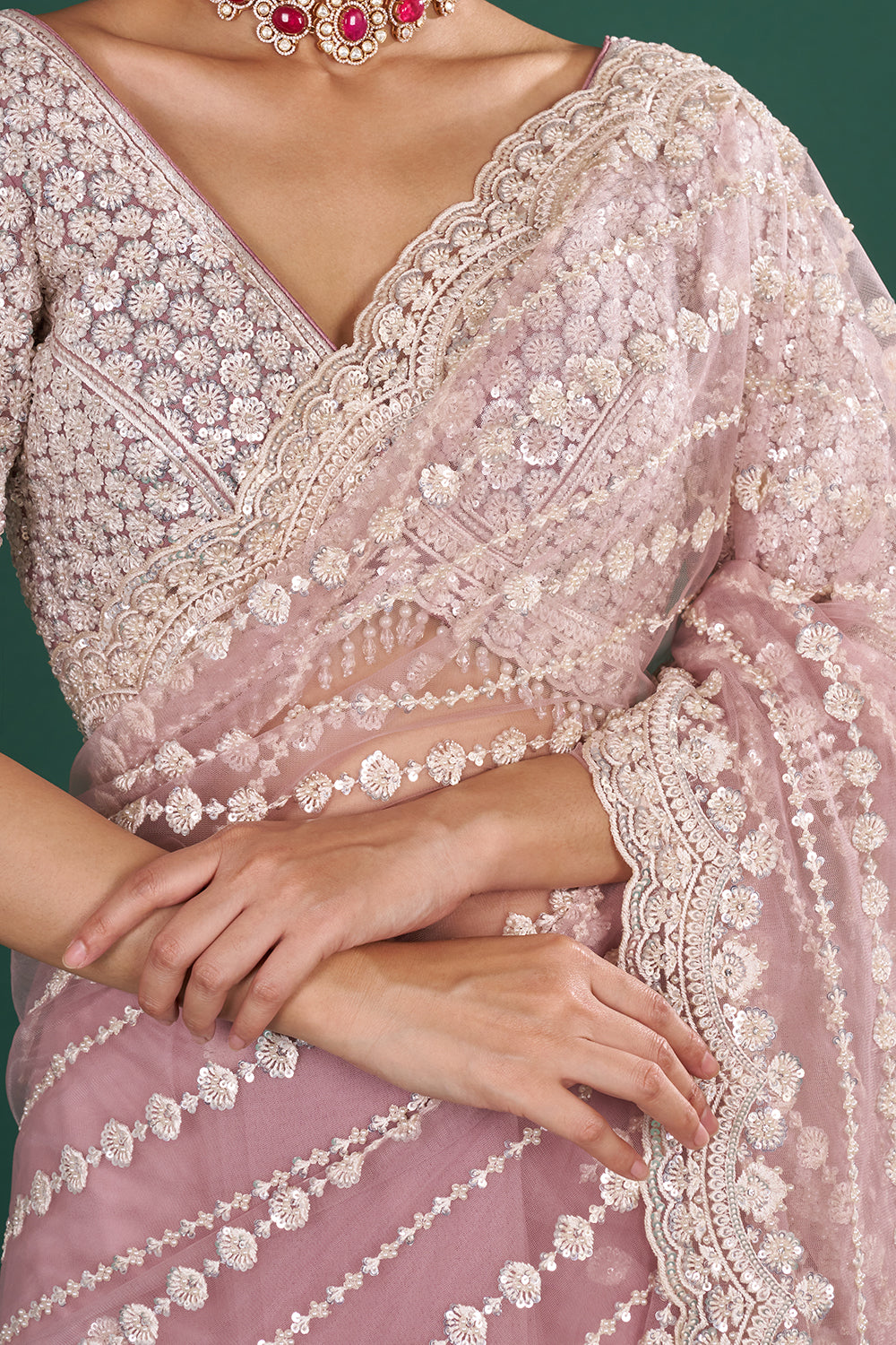 Onion Pink Net Saree with Scalloped Border and Stitched Blouse