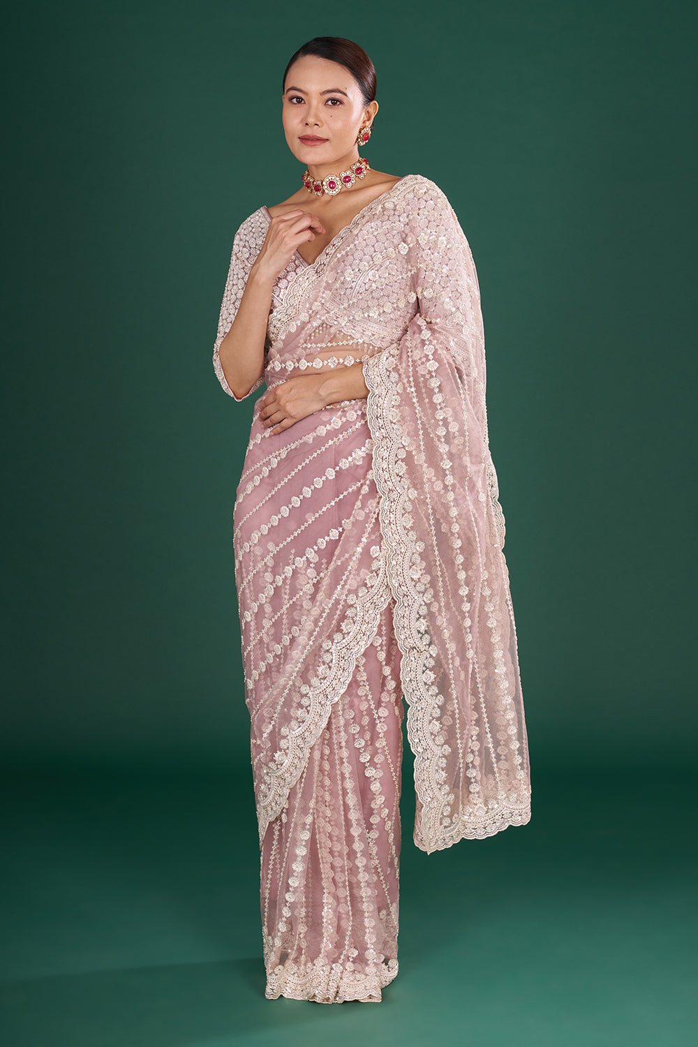 Onion Pink Net Saree with Scalloped Border and Stitched Blouse