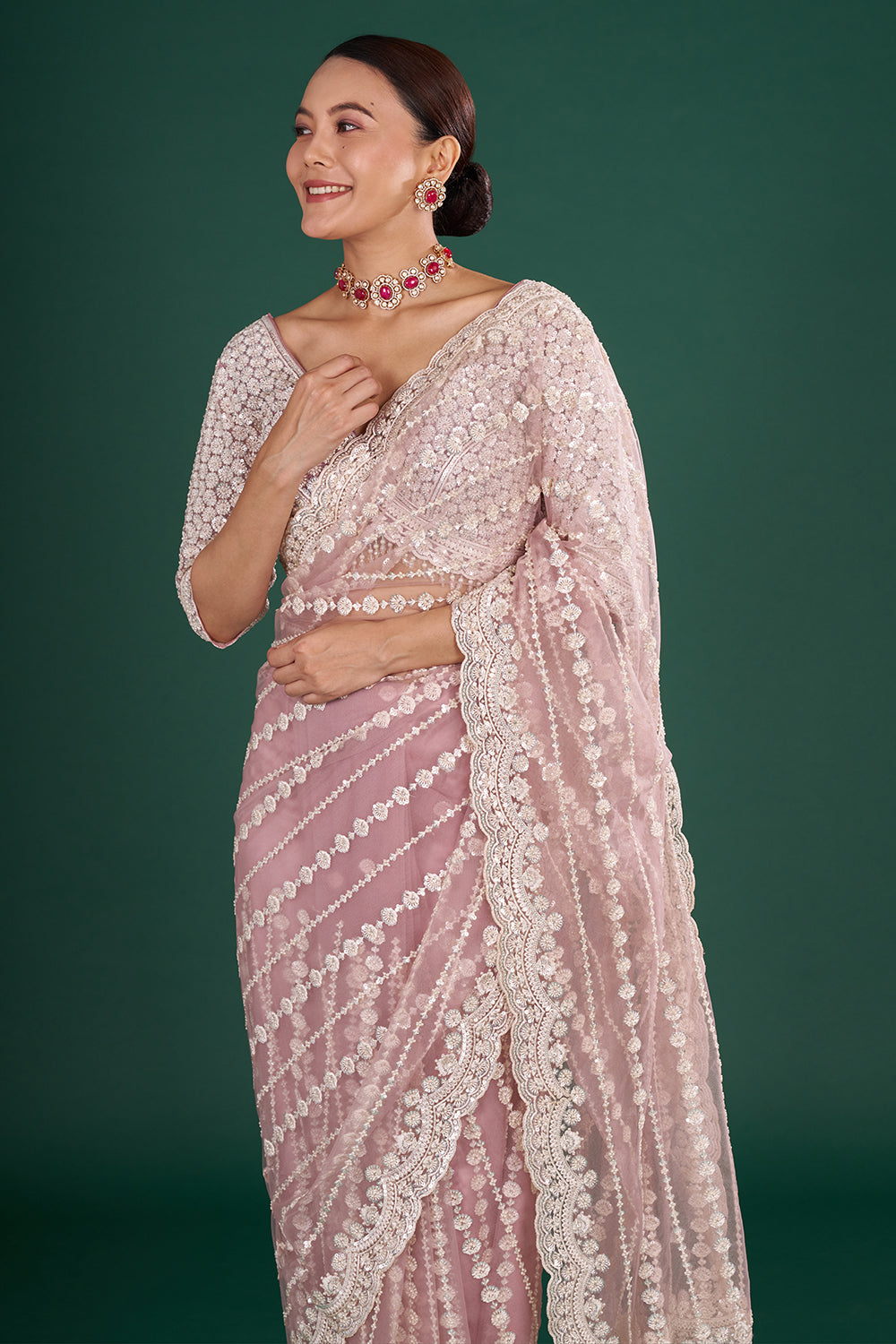 Onion Pink Net Saree with Scalloped Border and Stitched Blouse
