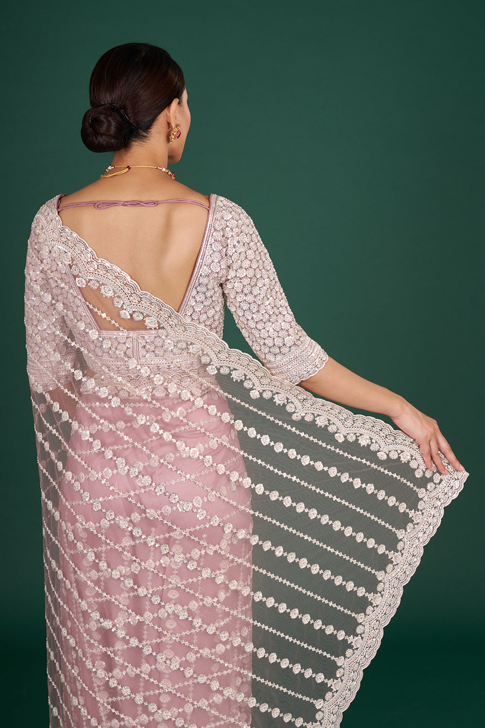 Onion Pink Net Saree with Scalloped Border and Stitched Blouse