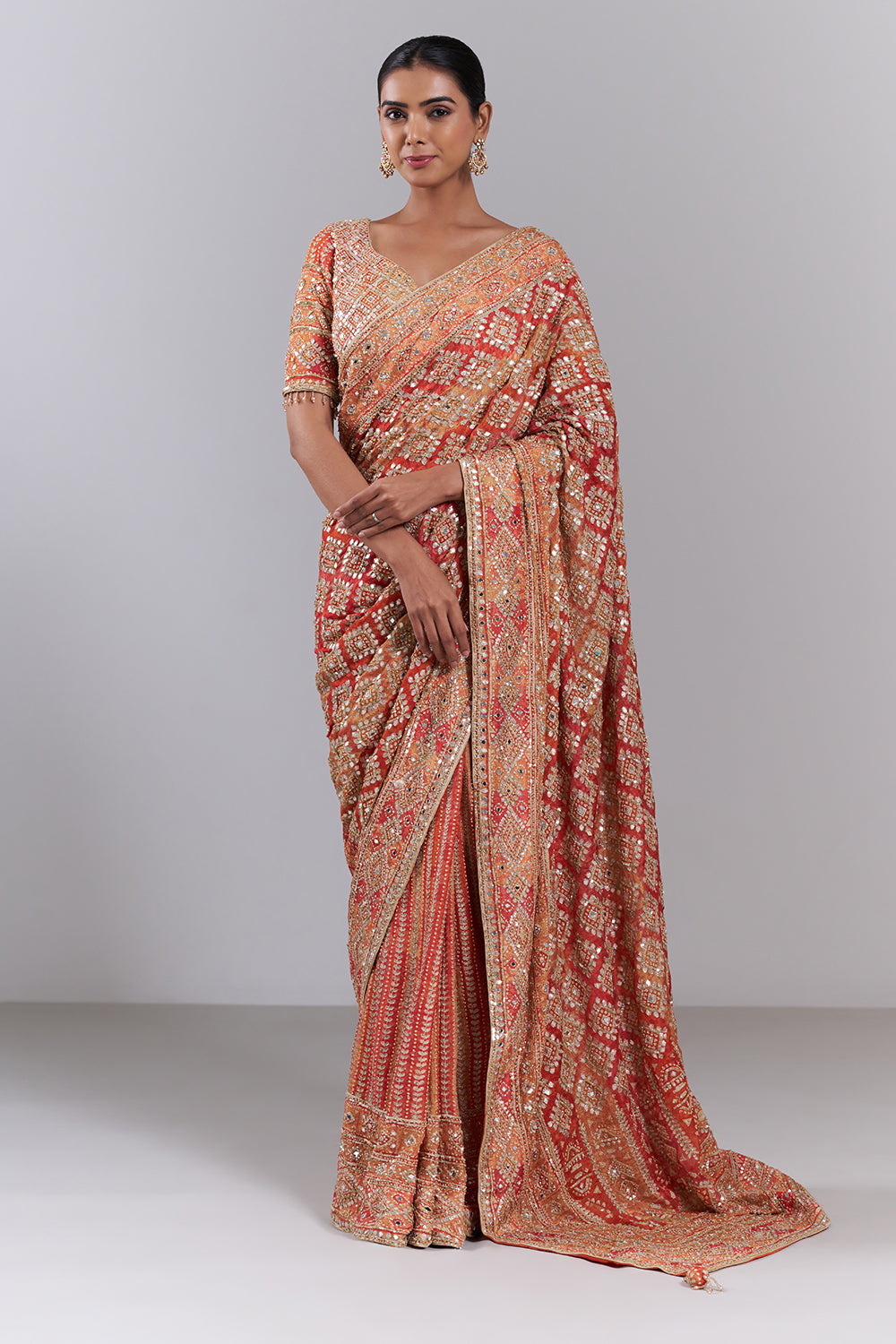 Orange Crepe Embellished Saree And Stitched Blouse