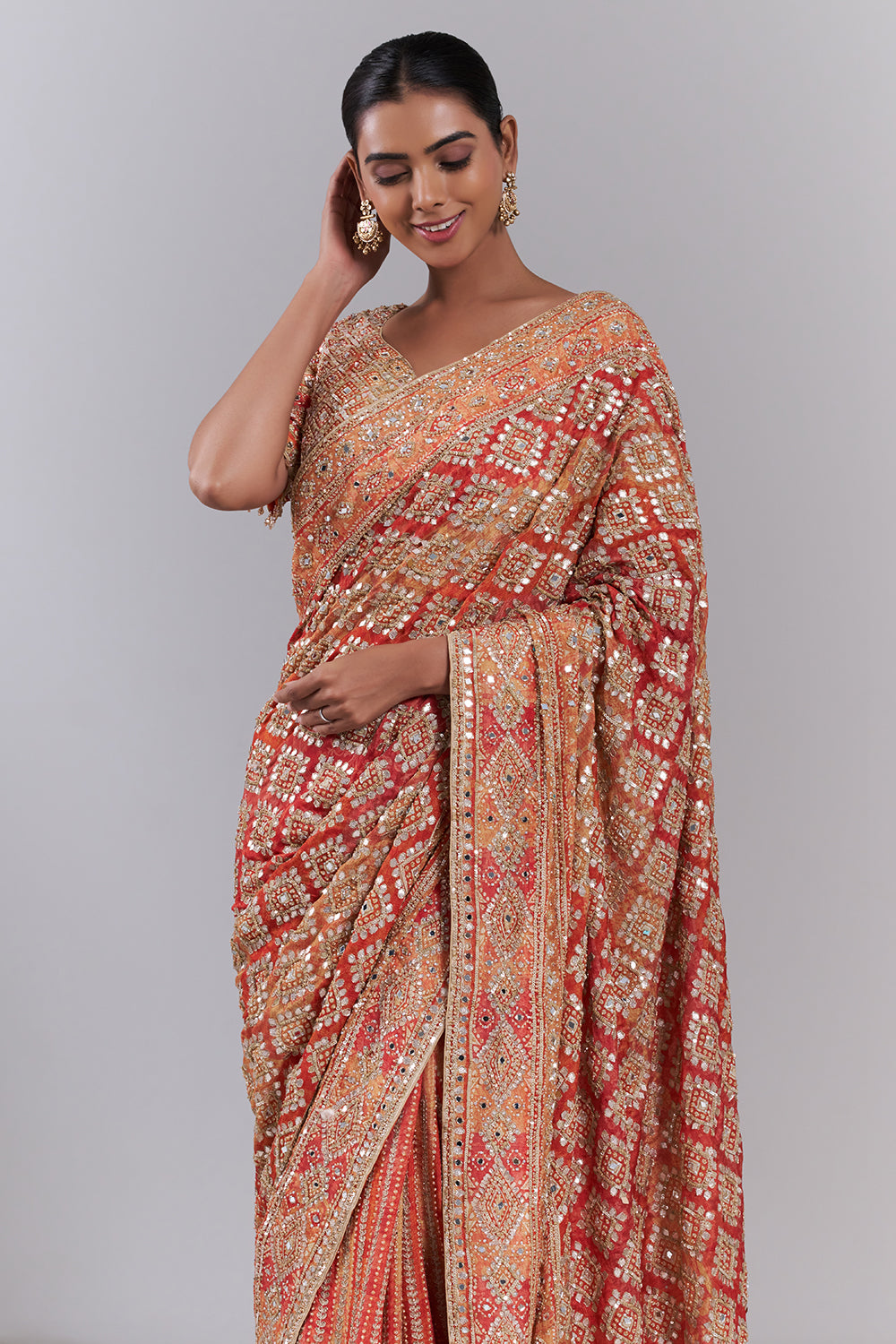 Orange Crepe Embellished Saree And Stitched Blouse