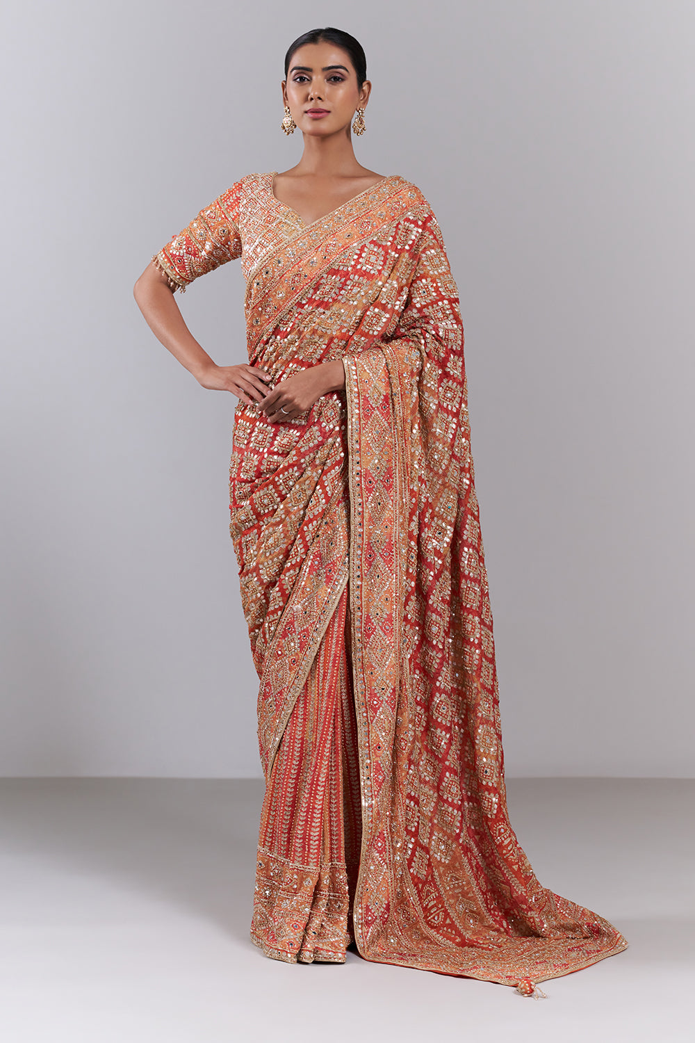 Orange Crepe Embellished Saree And Stitched Blouse