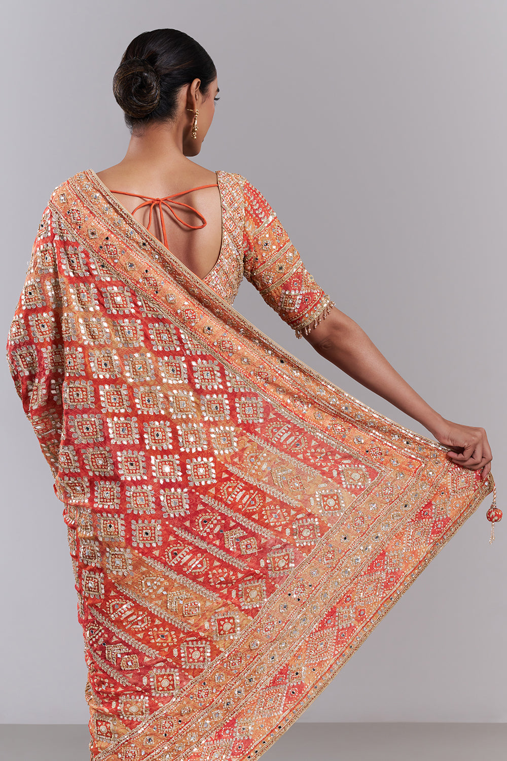 Orange Crepe Embellished Saree And Stitched Blouse