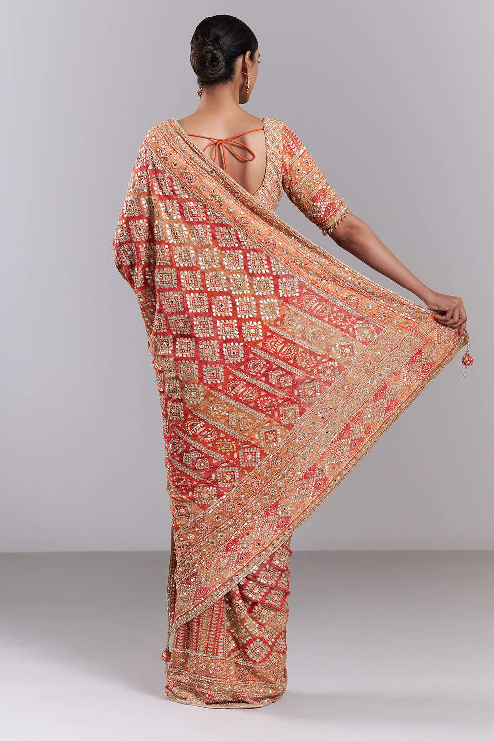 Orange Crepe Embellished Saree And Stitched Blouse