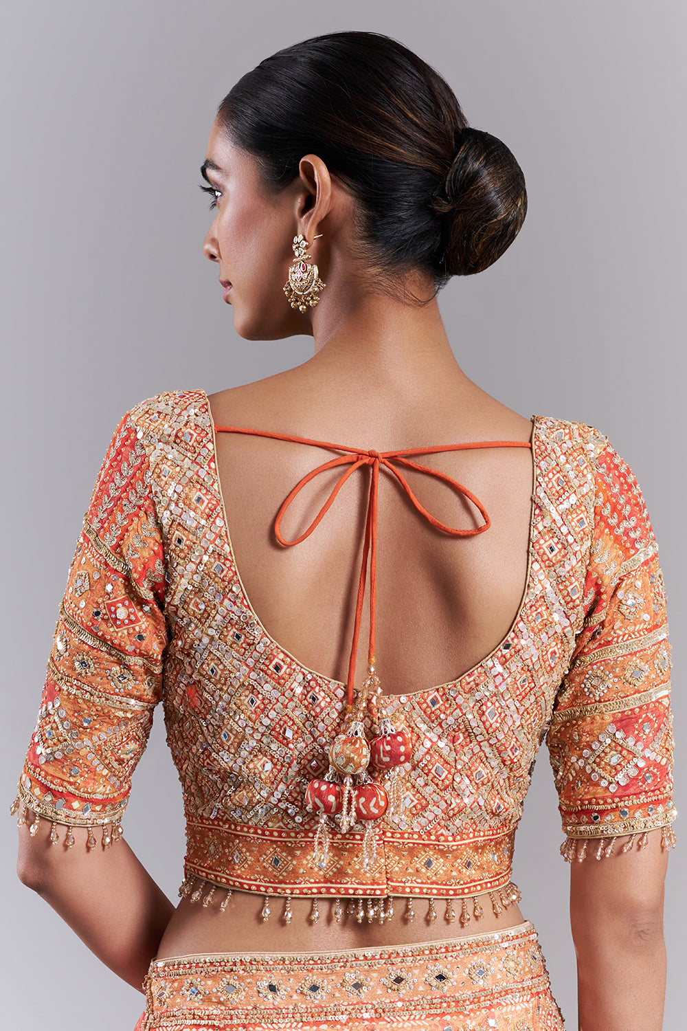 Orange Crepe Embellished Saree And Stitched Blouse