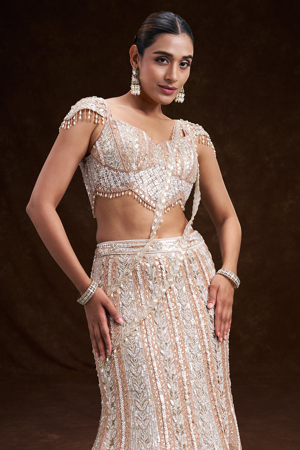 Peach and Silver Net Bridal Lehenga with 3D Floral Embroidery
