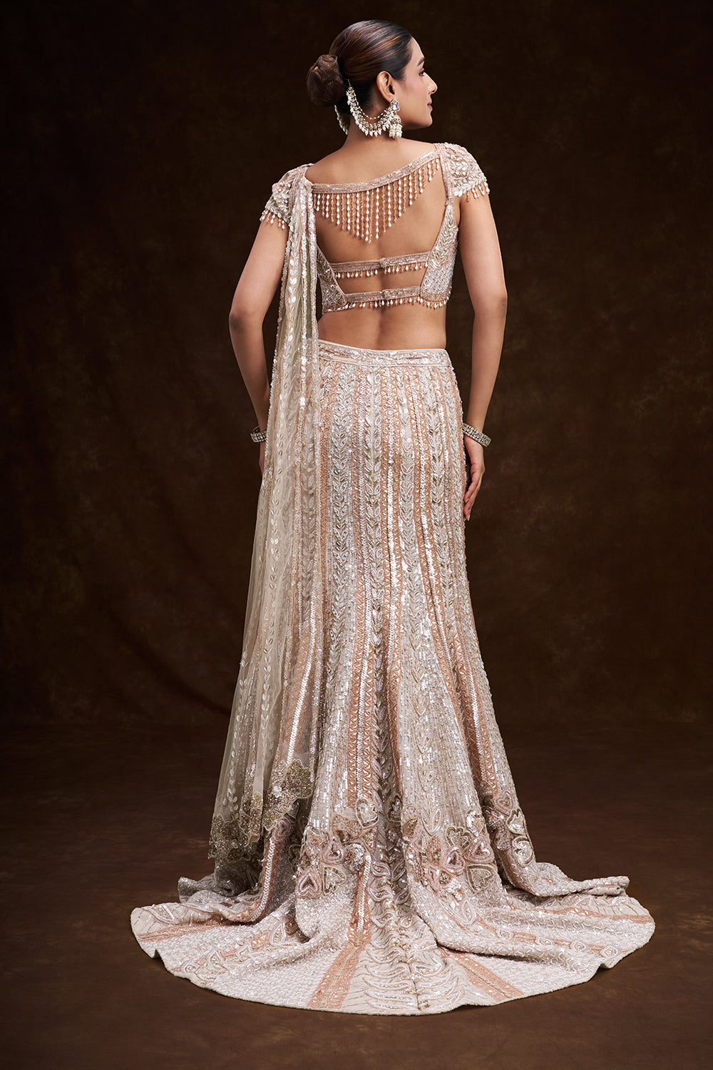 Peach and Silver Net Bridal Lehenga with 3D Floral Embroidery