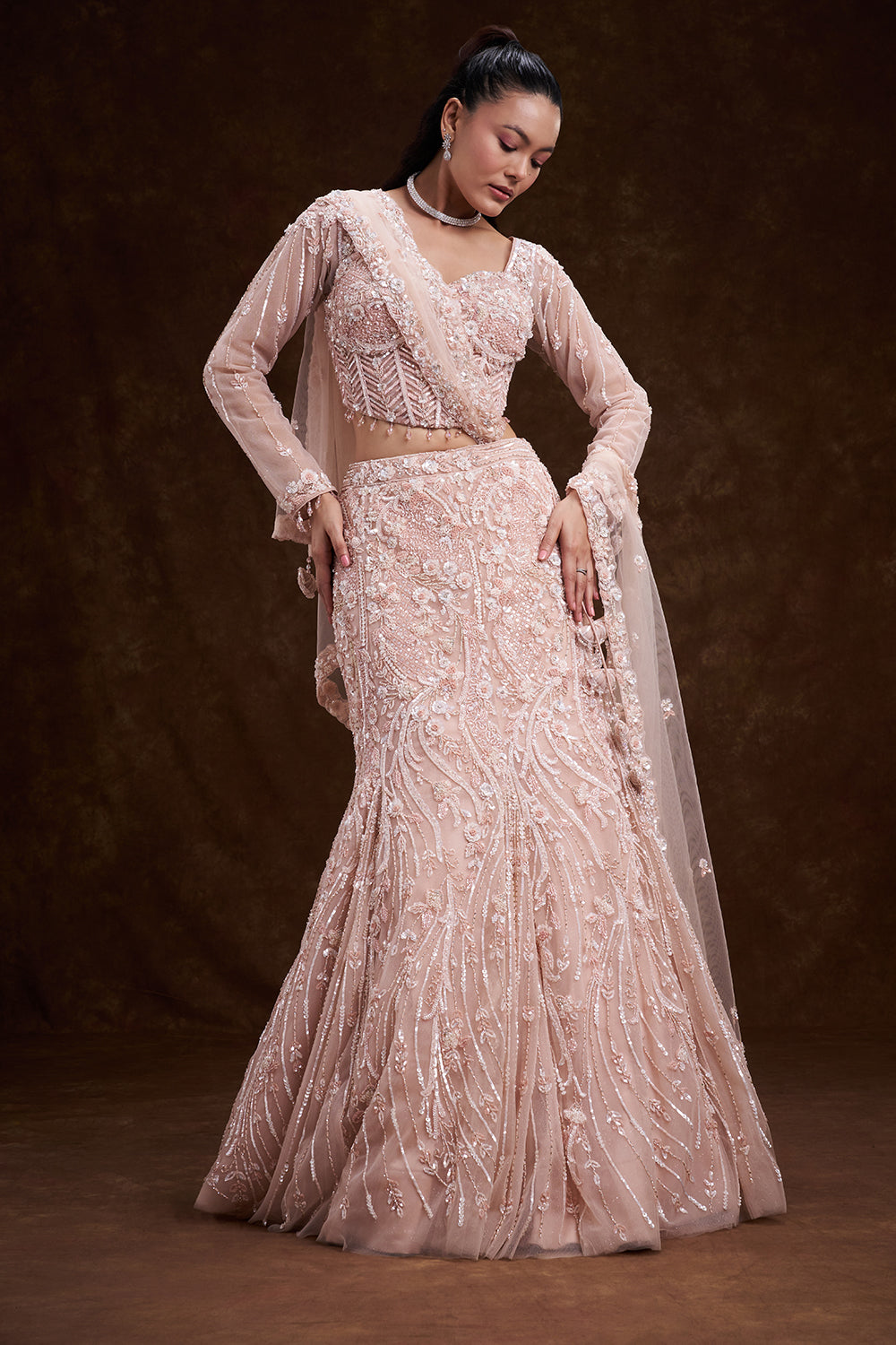Peach Net Bridal Lehenga with Corset Blouse and Fish-Cut Silhouette