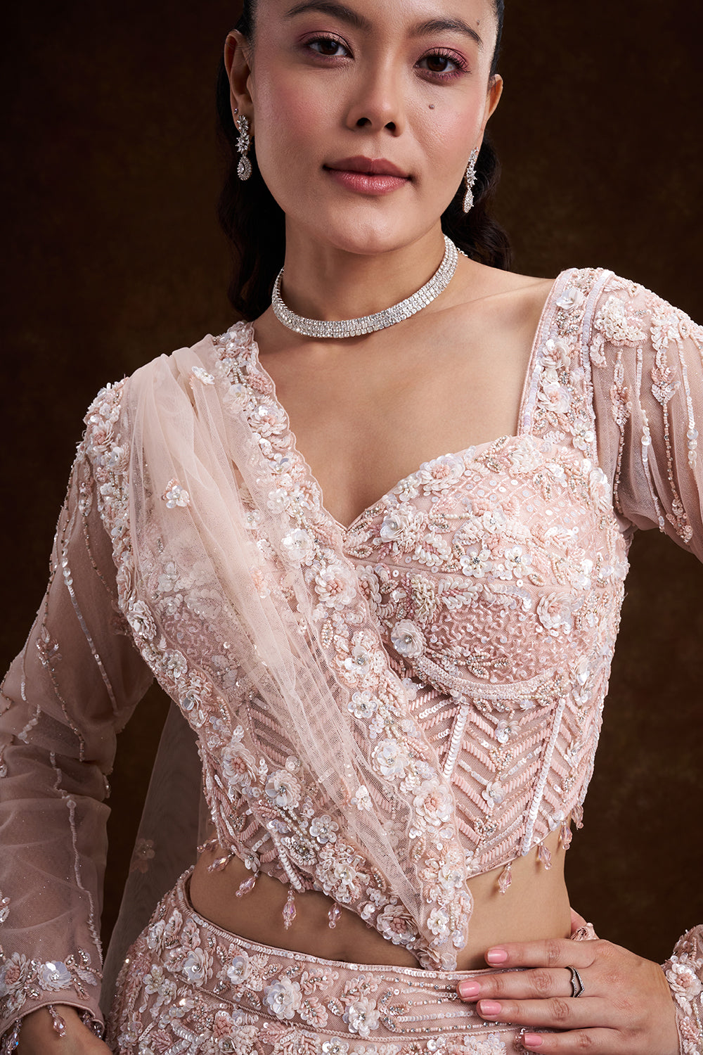 Peach Net Bridal Lehenga with Corset Blouse and Fish-Cut Silhouette