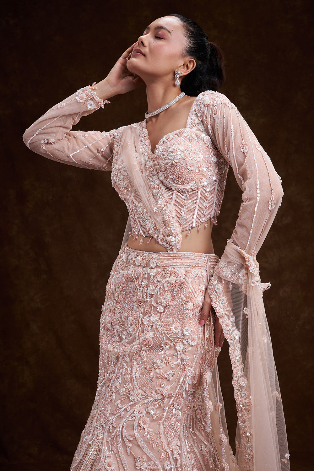 Peach Net Bridal Lehenga with Corset Blouse and Fish-Cut Silhouette