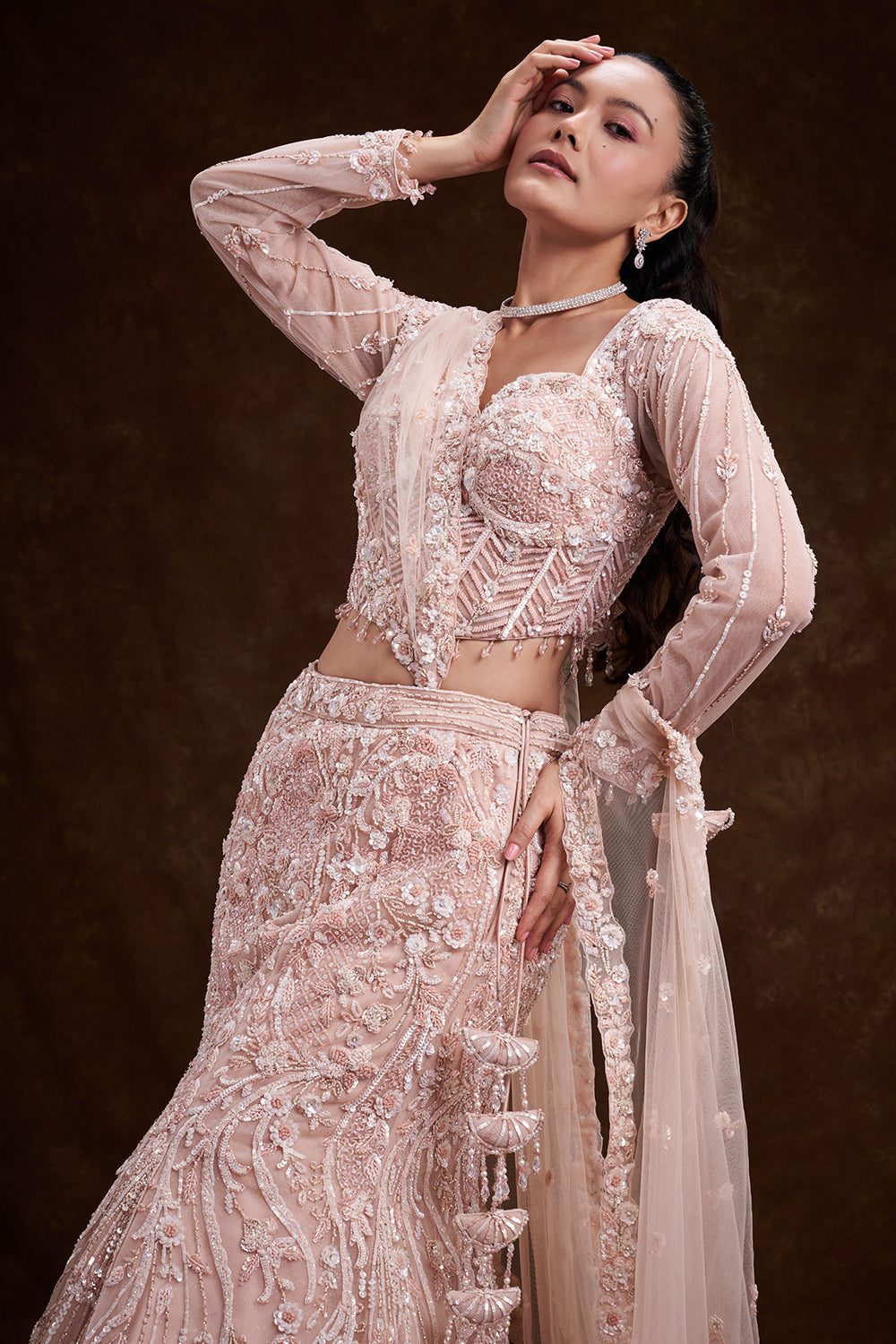 Peach Net Bridal Lehenga with Corset Blouse and Fish-Cut Silhouette