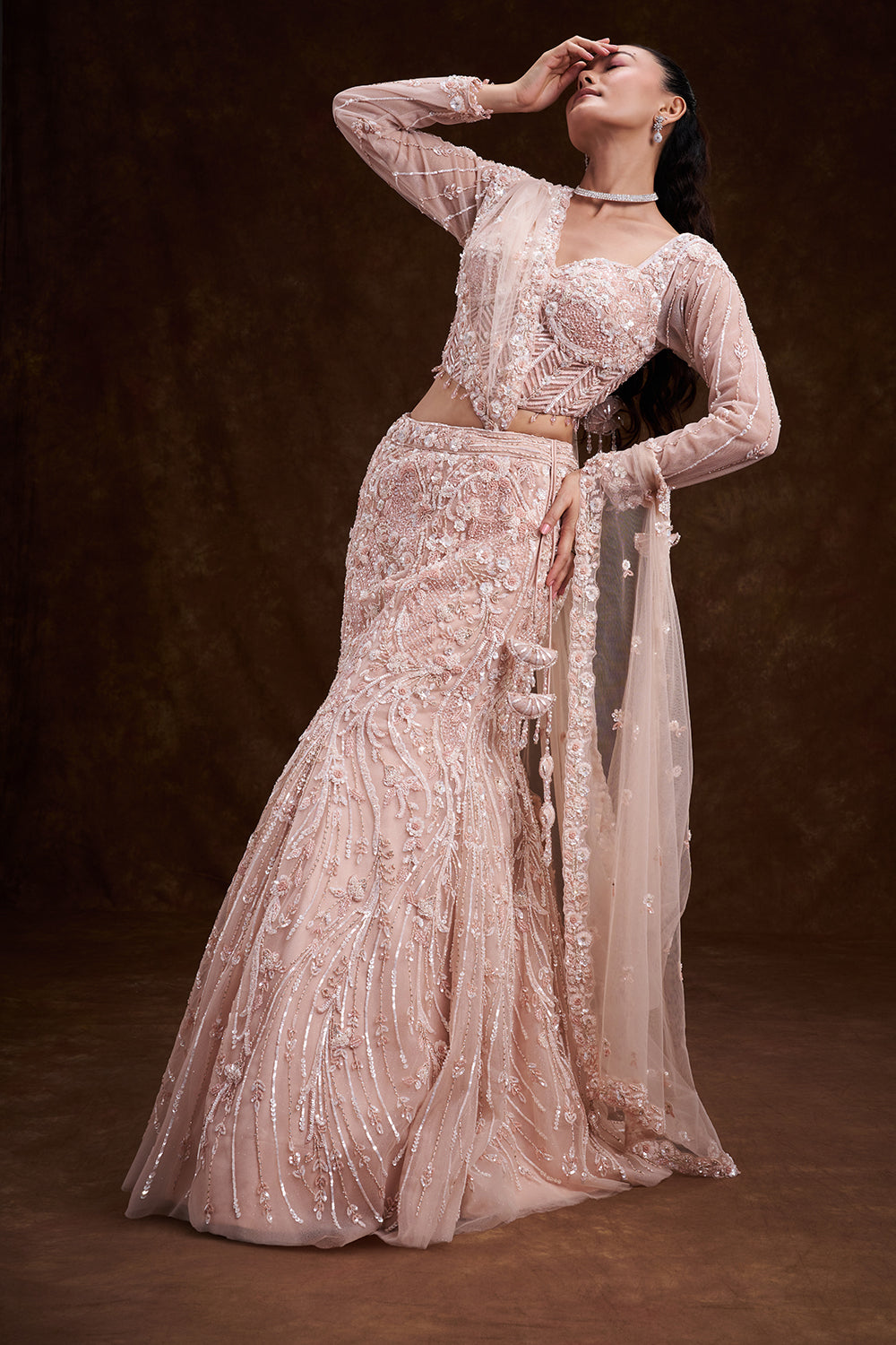 Peach Net Bridal Lehenga with Corset Blouse and Fish-Cut Silhouette
