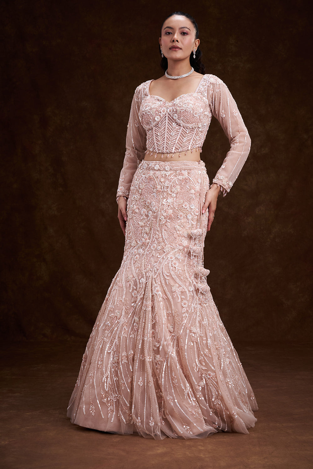 Peach Net Bridal Lehenga with Corset Blouse and Fish-Cut Silhouette