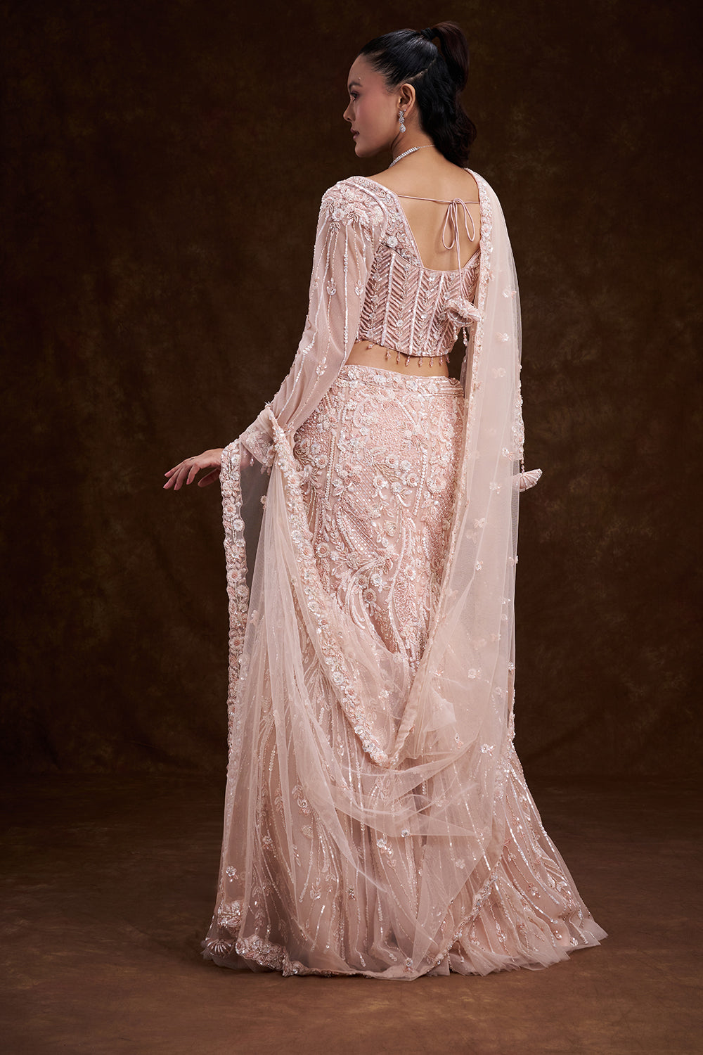 Peach Net Bridal Lehenga with Corset Blouse and Fish-Cut Silhouette
