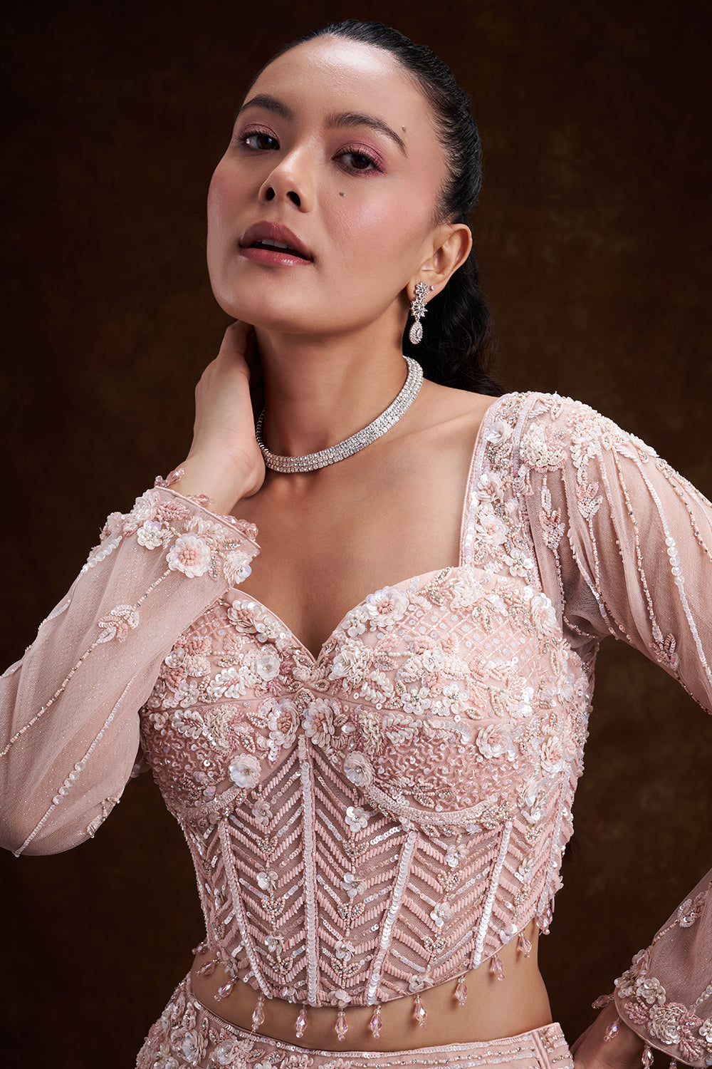 Peach Net Bridal Lehenga with Corset Blouse and Fish-Cut Silhouette