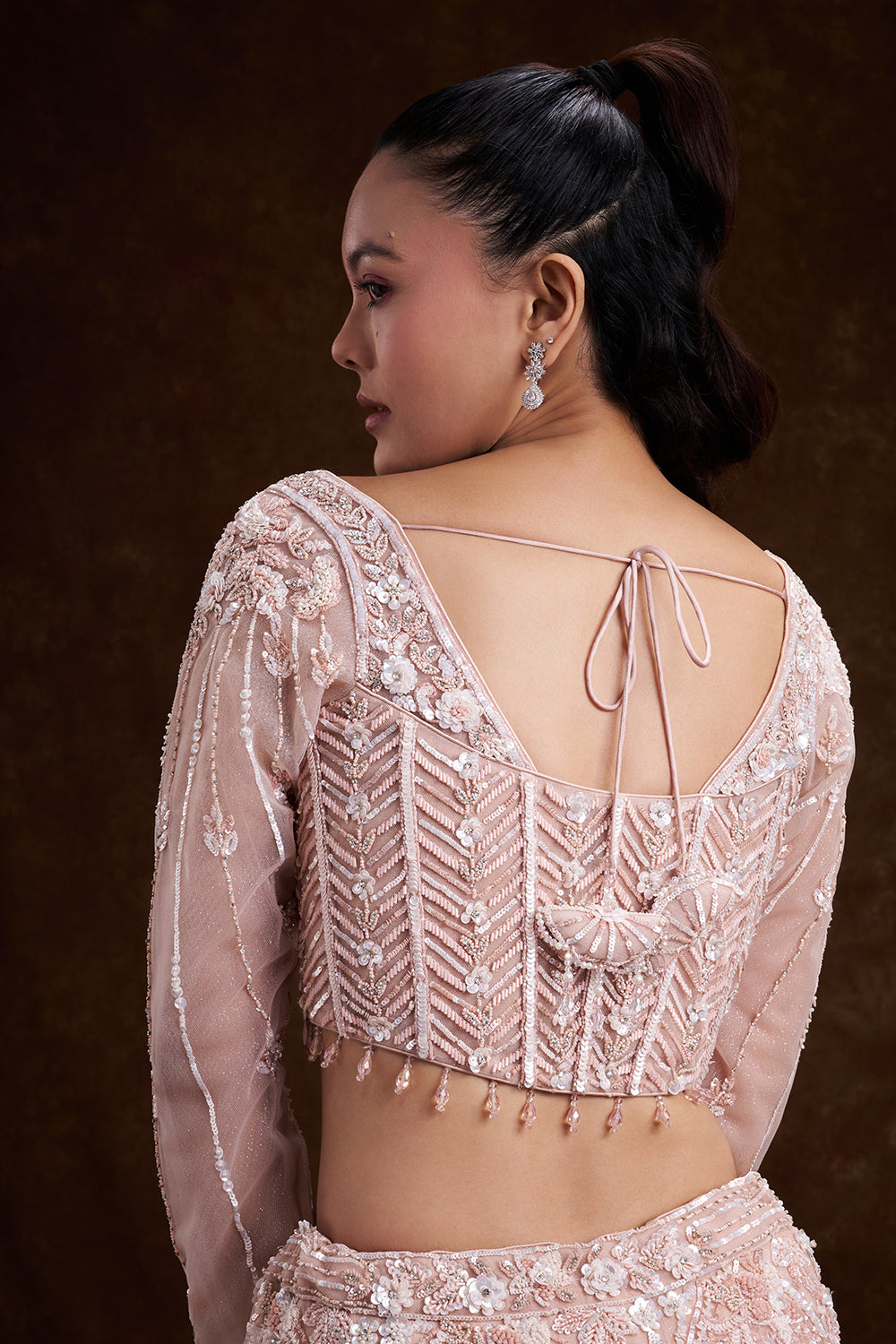 Peach Net Bridal Lehenga with Corset Blouse and Fish-Cut Silhouette
