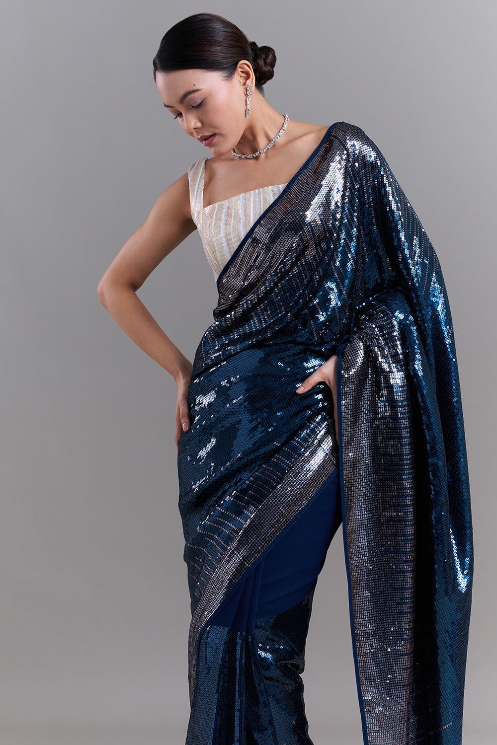 Peacock Blue Georgette Saree with Sequin Detailing