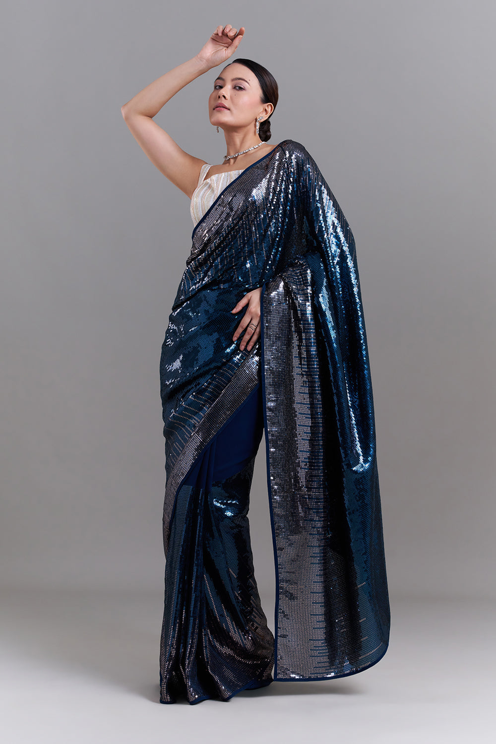 Peacock Blue Georgette Saree with Sequin Detailing
