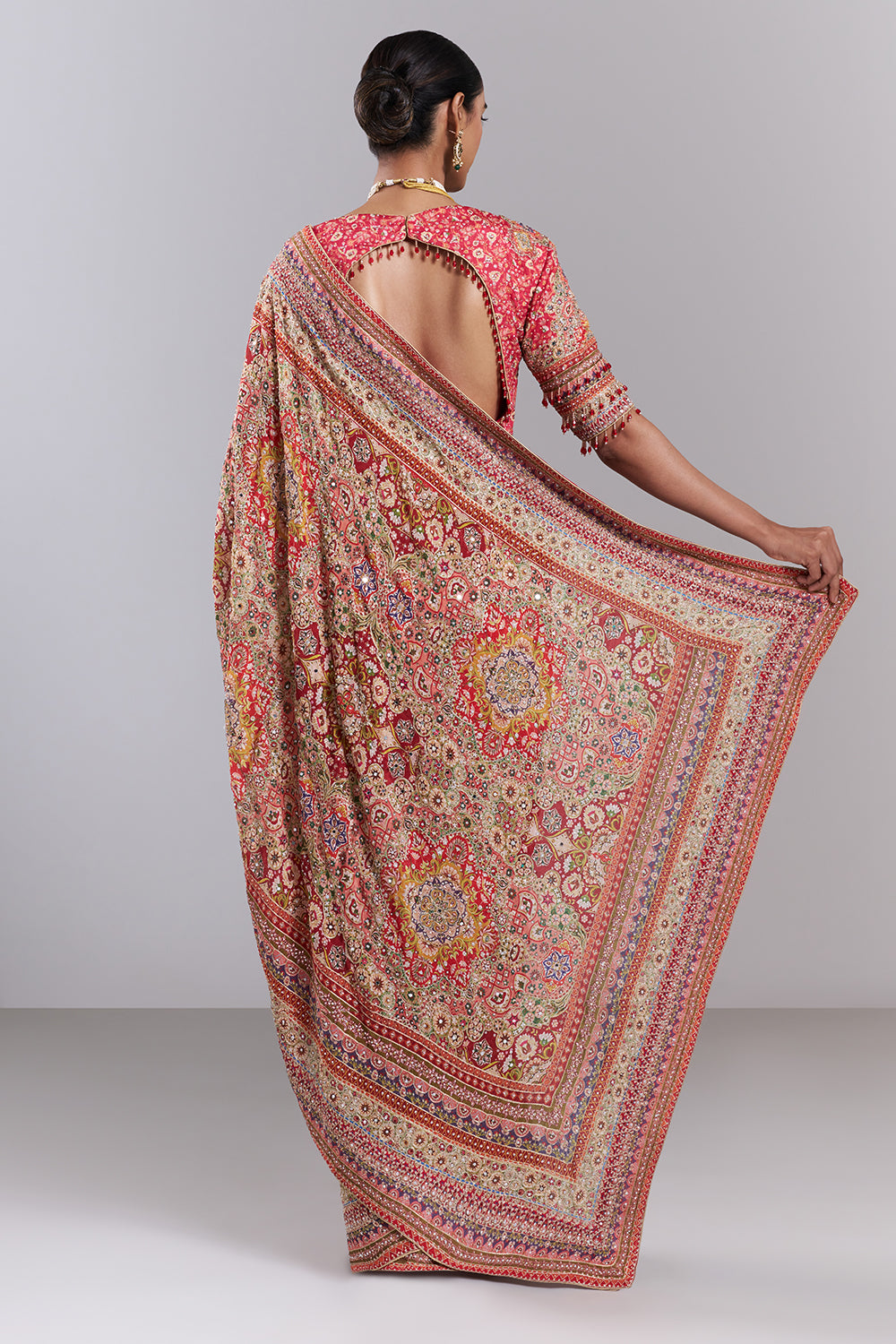 Pink Crepe Embellished Saree And Stitched Blouse