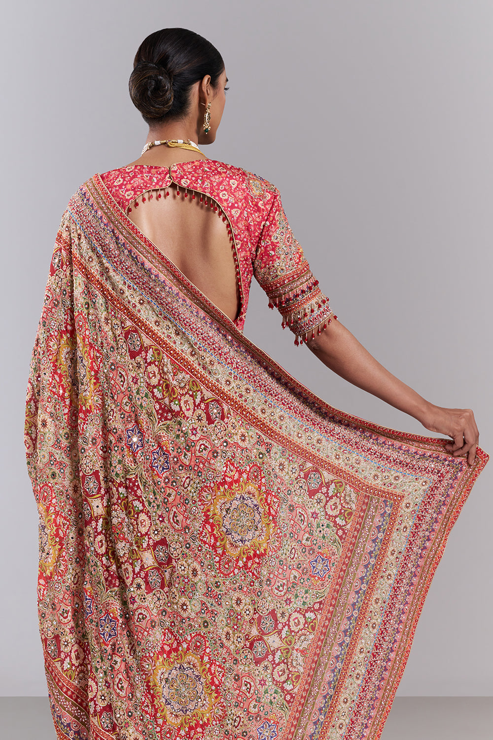 Pink Crepe Embellished Saree And Stitched Blouse