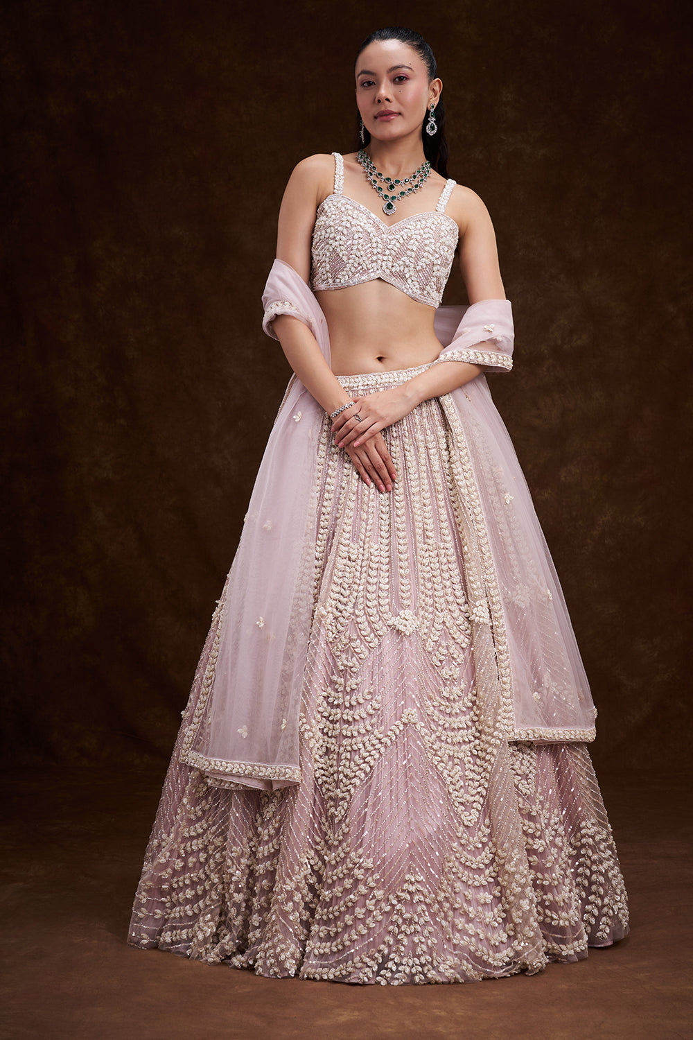 Pink Net Bridal Lehenga with Mother of Pearl Embellishments