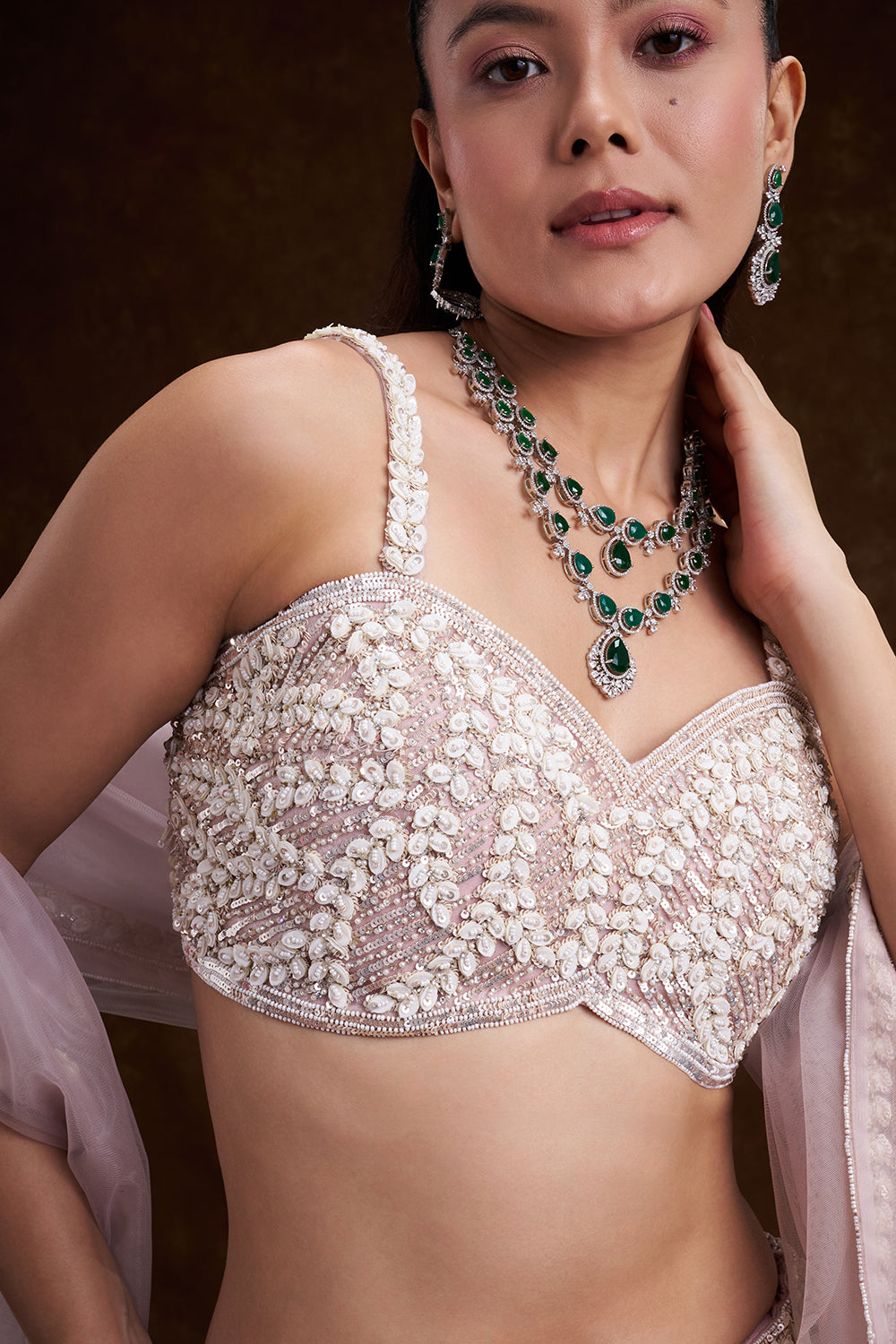 Pink Net Bridal Lehenga with Mother of Pearl Embellishments