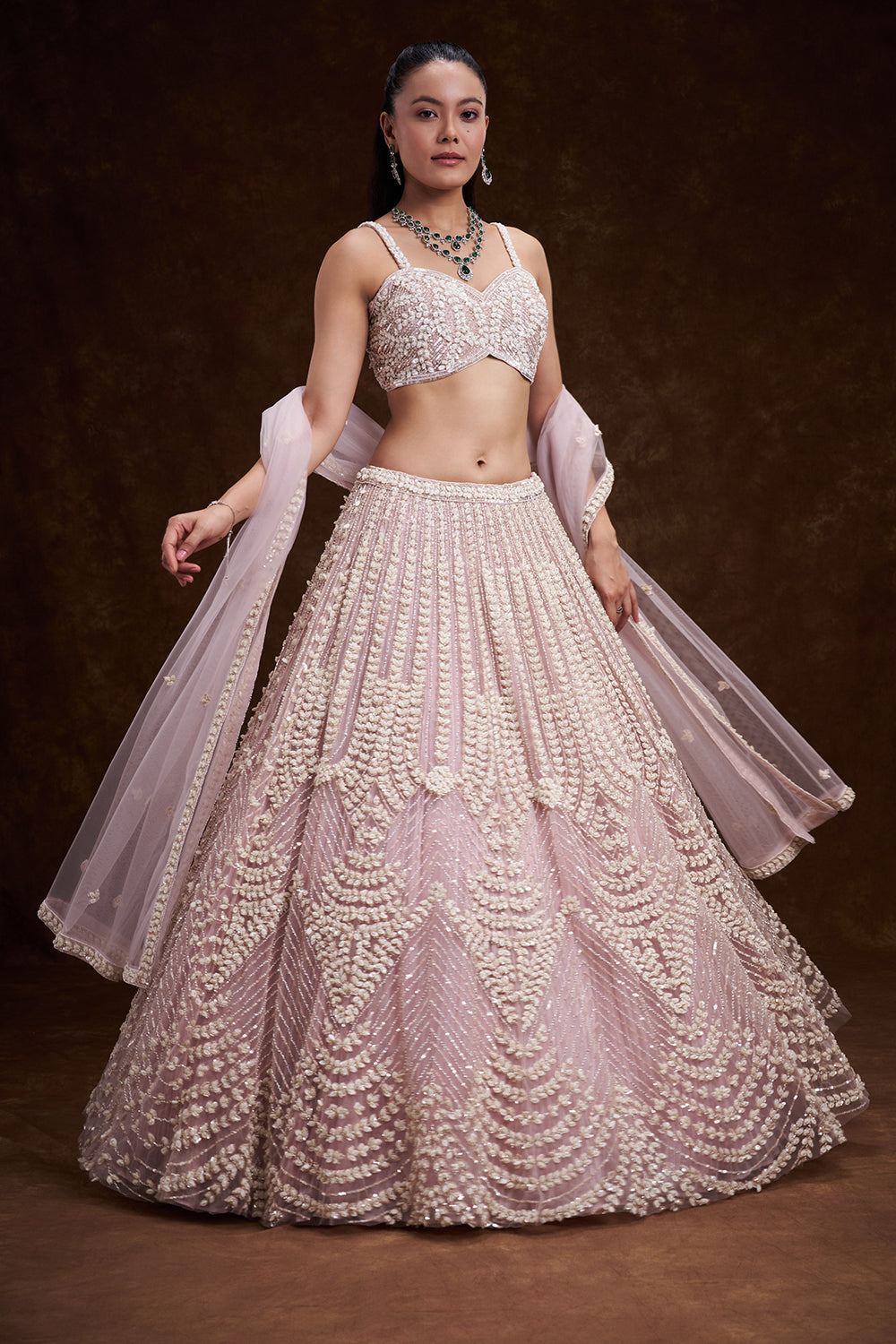 Pink Net Bridal Lehenga with Mother of Pearl Embellishments