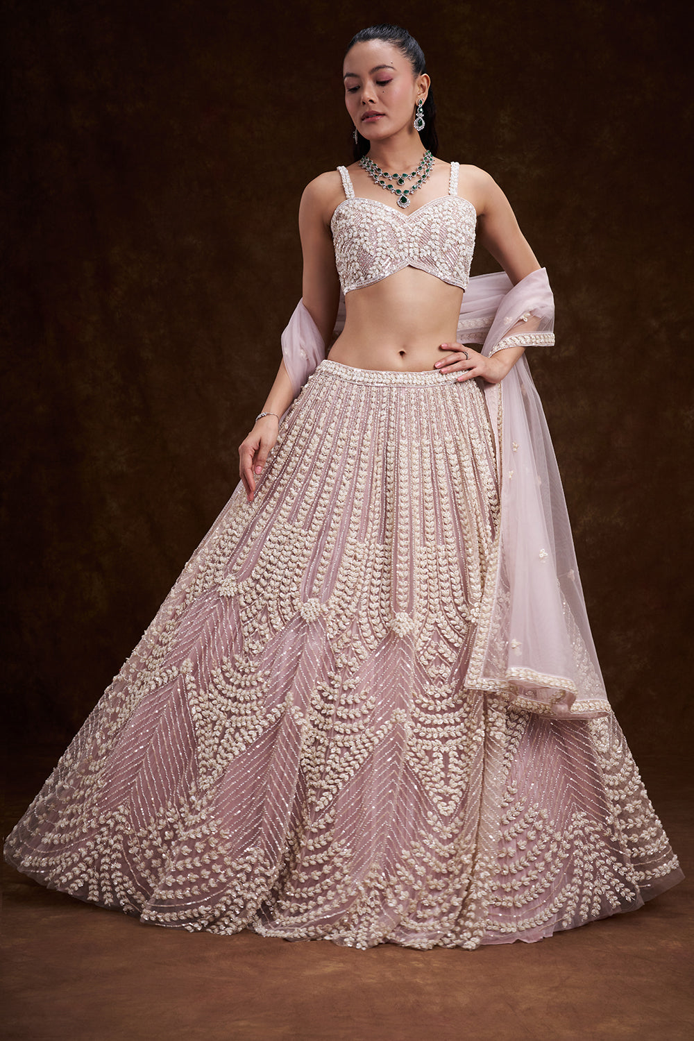 Pink Net Bridal Lehenga with Mother of Pearl Embellishments