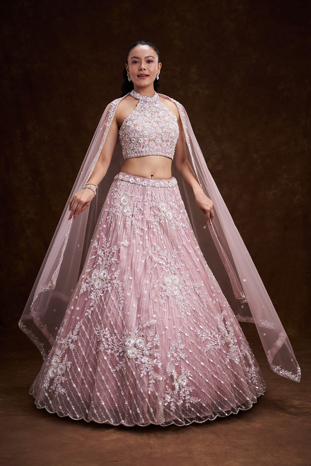 Pink Net Bridal Lehenga with Ornate Halter Blouse and Embellished Dupatta