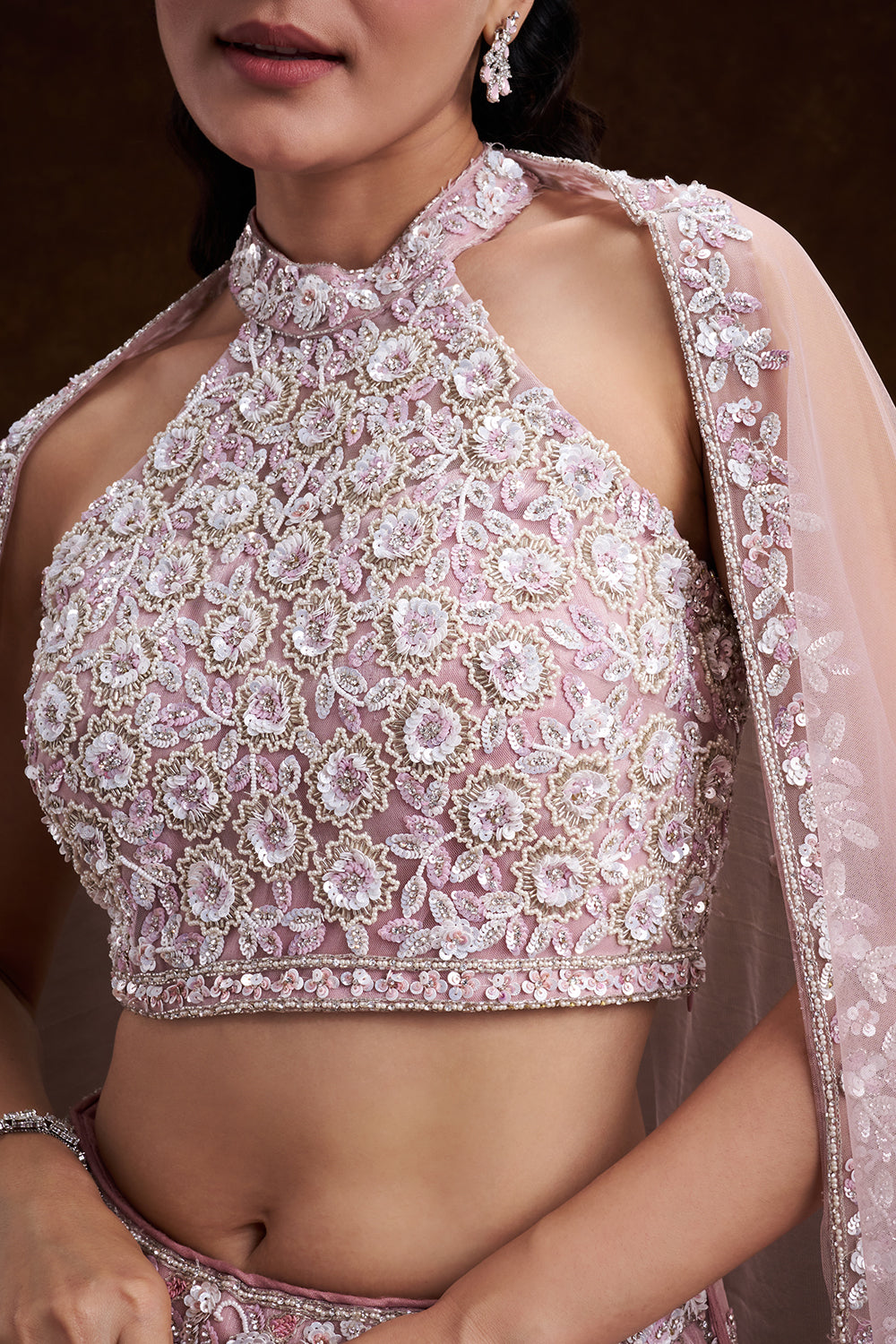 Pink Net Bridal Lehenga with Ornate Halter Blouse and Embellished Dupatta