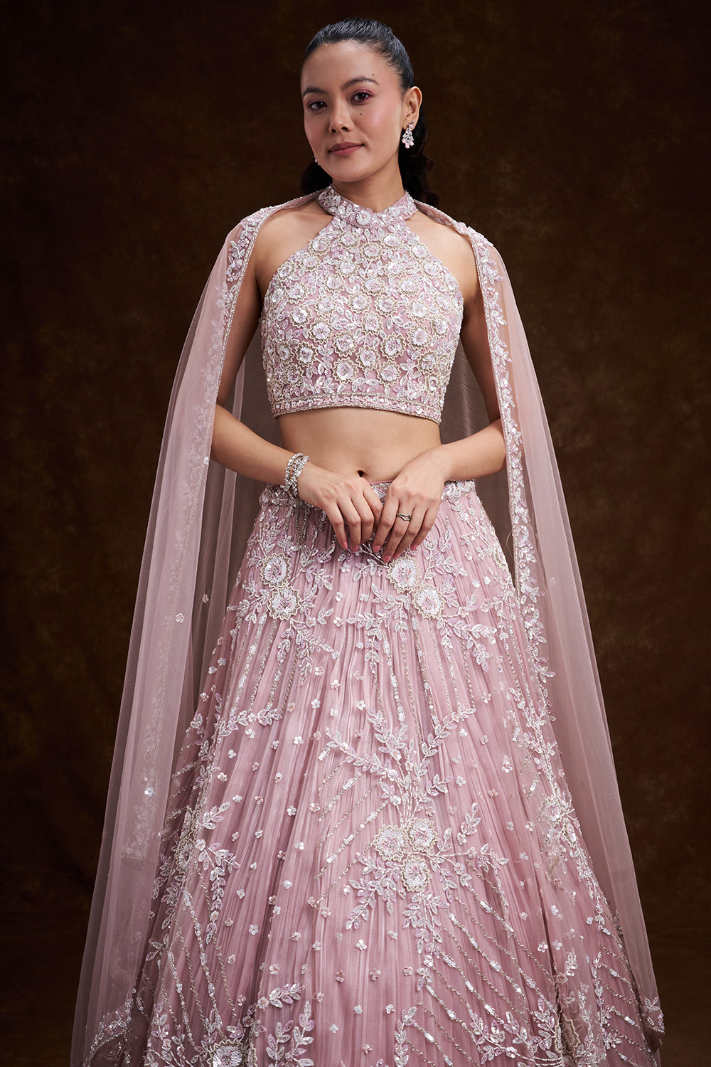 Pink Net Bridal Lehenga with Ornate Halter Blouse and Embellished Dupatta