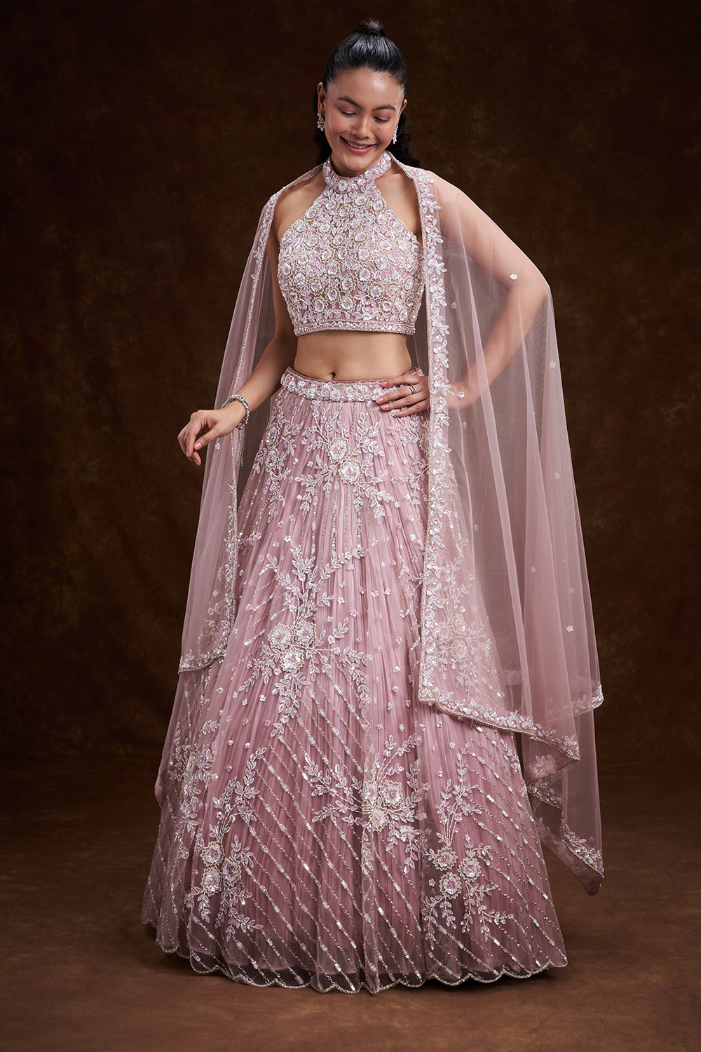 Pink Net Bridal Lehenga with Ornate Halter Blouse and Embellished Dupatta