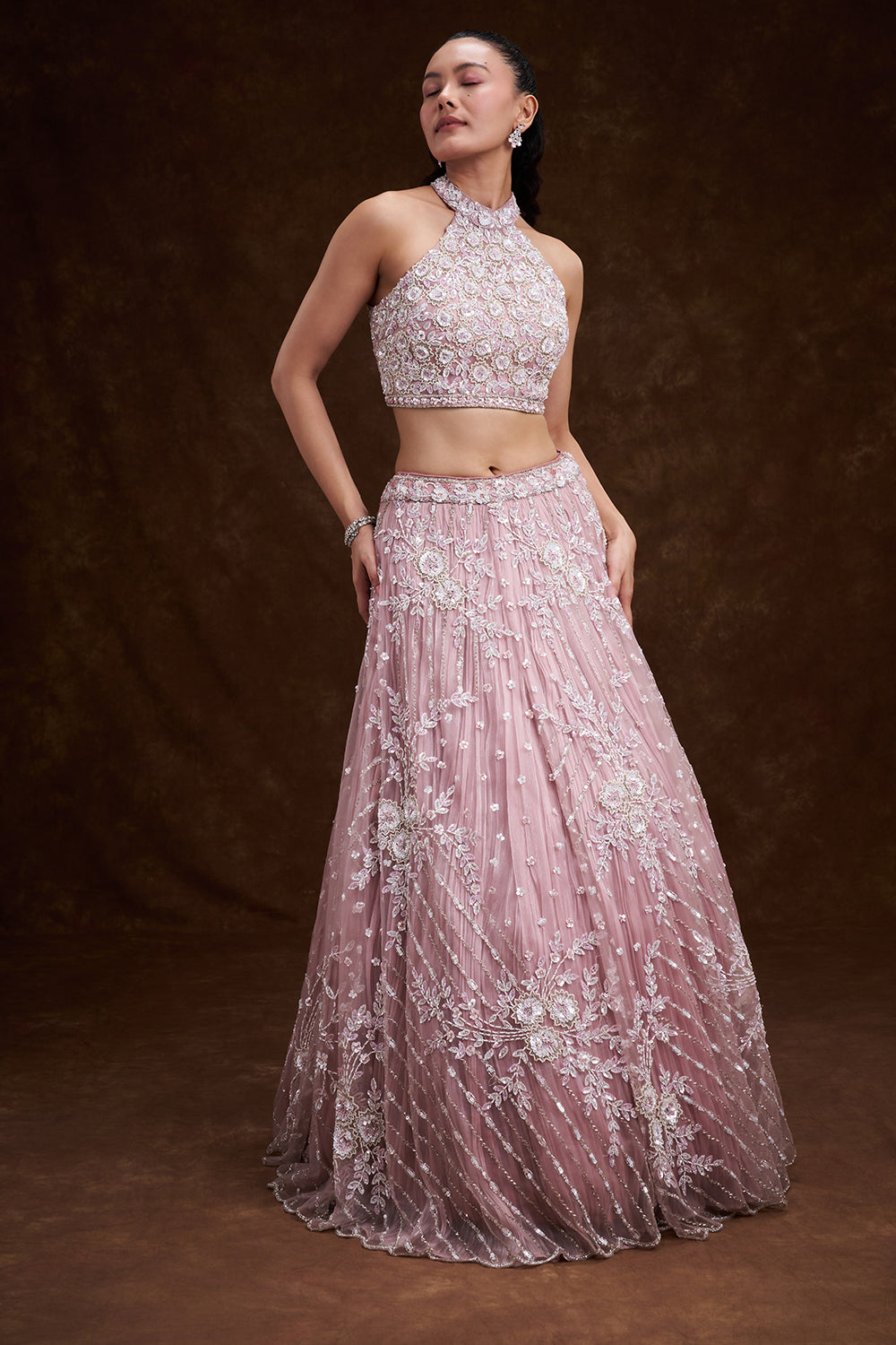Pink Net Bridal Lehenga with Ornate Halter Blouse and Embellished Dupatta