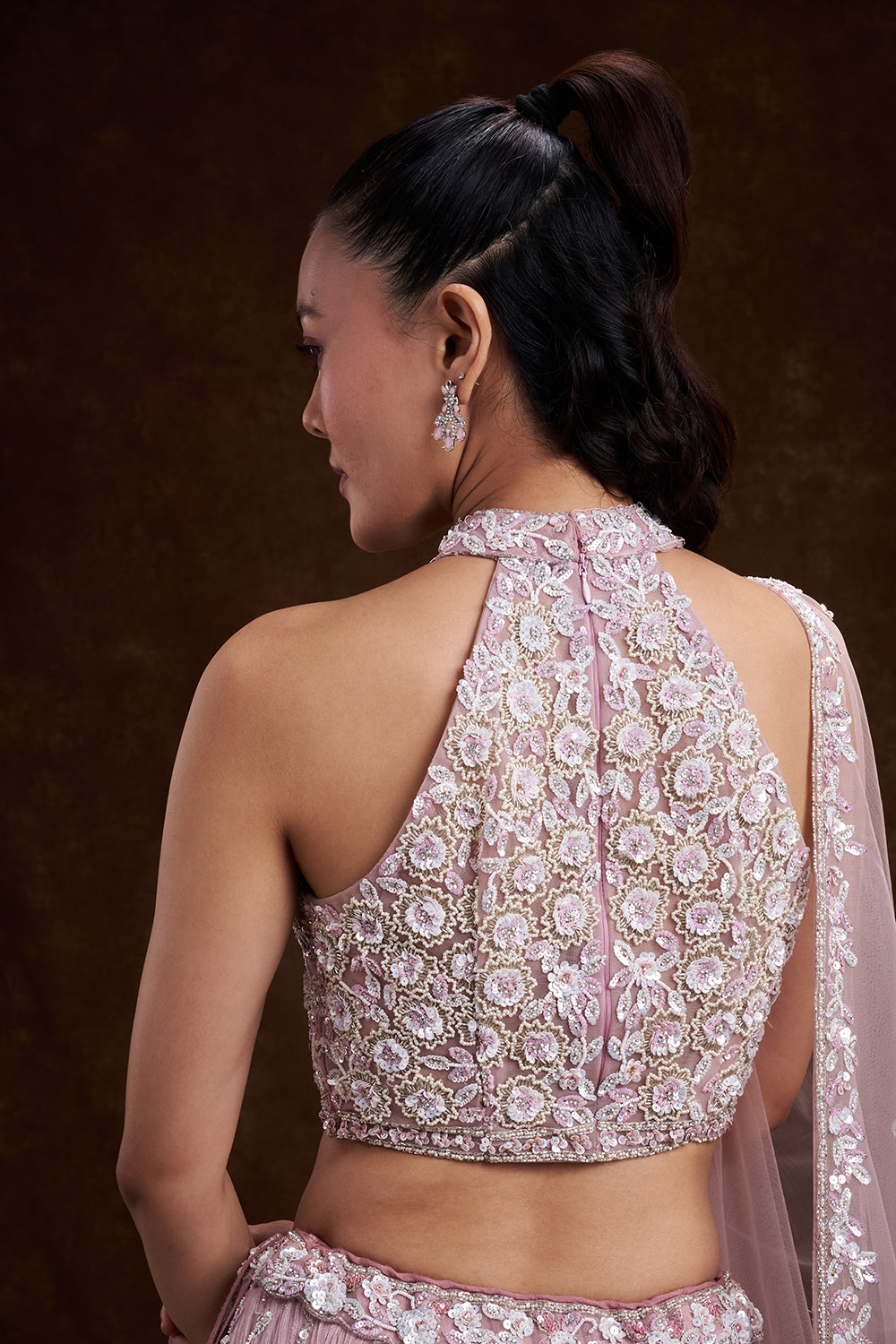 Pink Net Bridal Lehenga with Ornate Halter Blouse and Embellished Dupatta