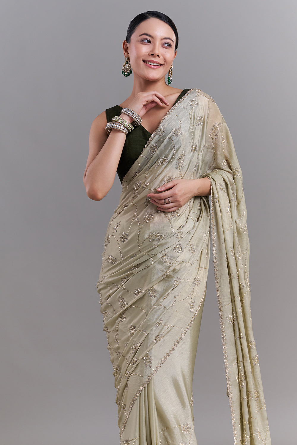Pista Green Stone and Cutdana Embellished Saree