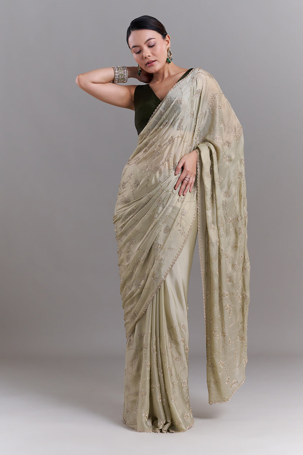 Pista Green Stone and Cutdana Embellished Saree