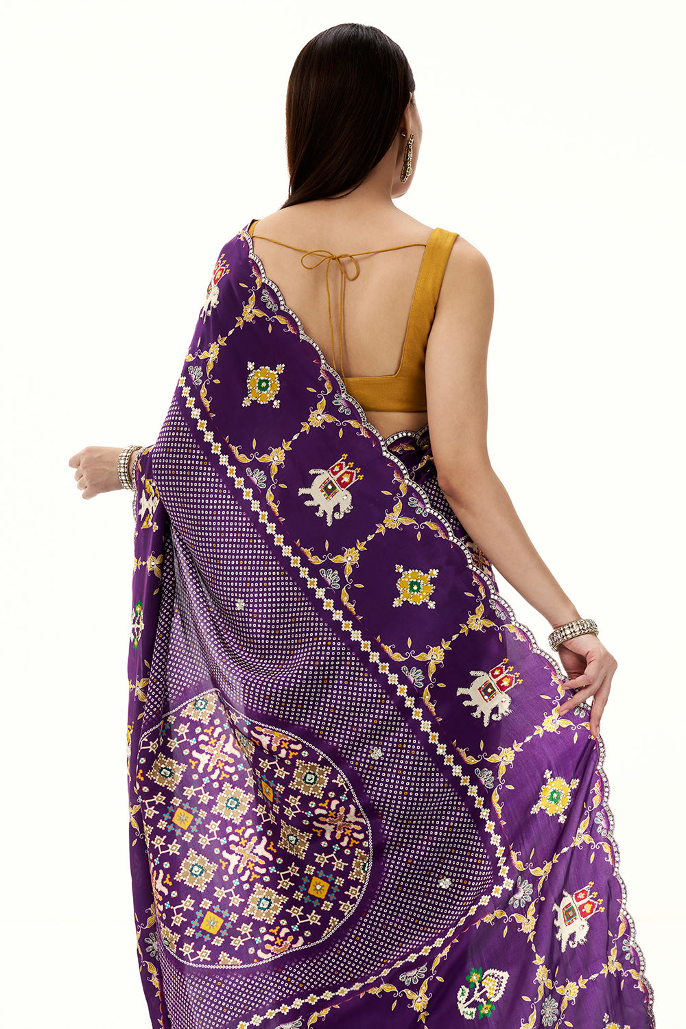 Purple Crepe Bandhani and Patola Printed Saree with Mirror Work