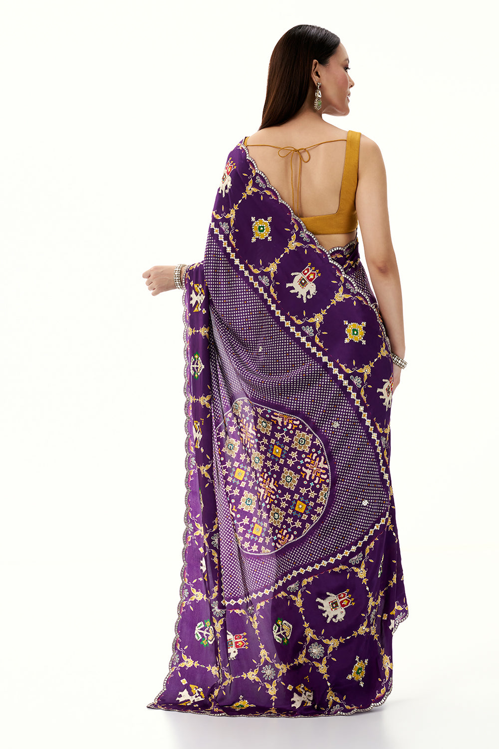 Purple Crepe Bandhani and Patola Printed Saree with Mirror Work