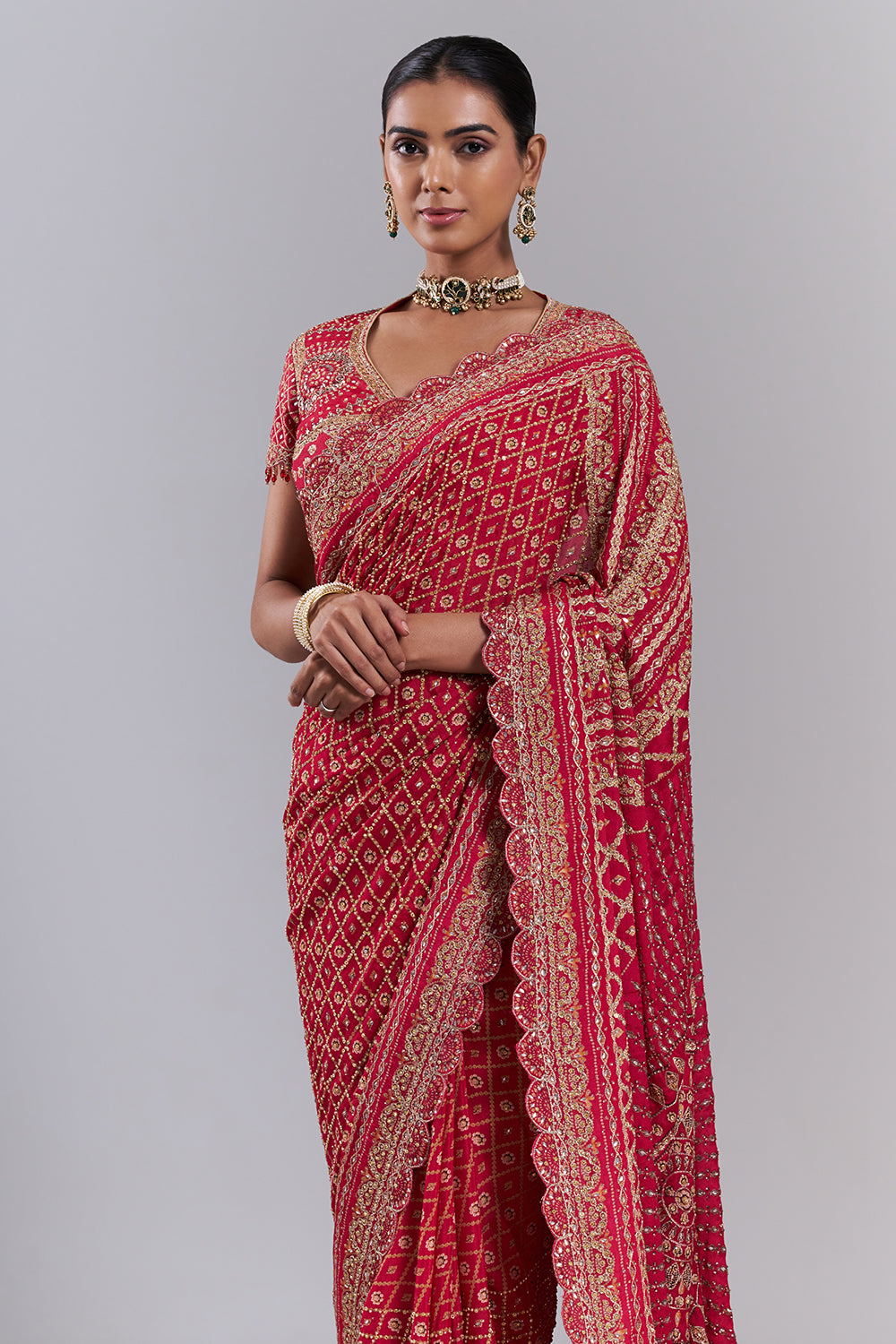 Rani Pink Georgette Embellished Saree And Stitched Blouse