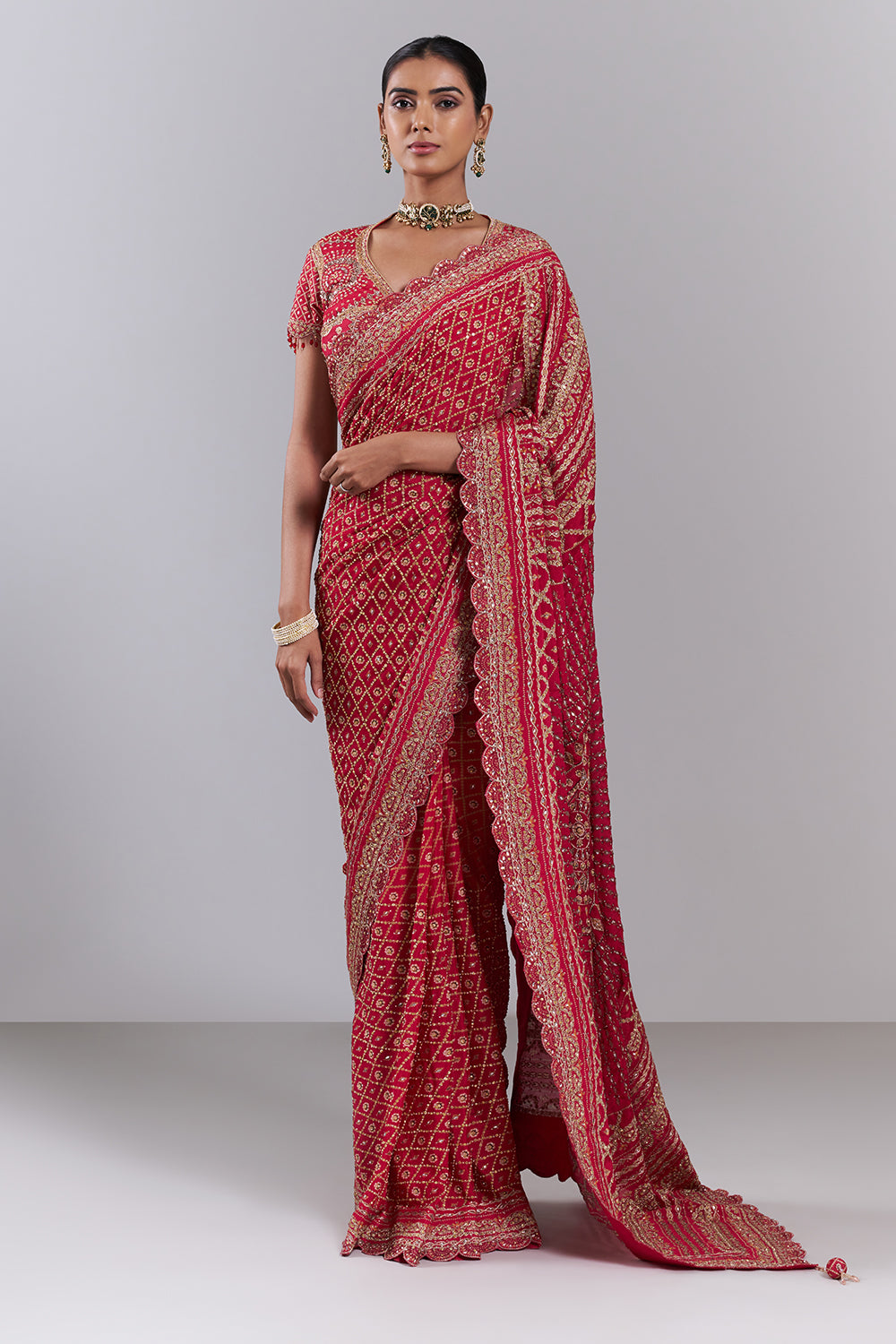 Rani Pink Georgette Embellished Saree And Stitched Blouse