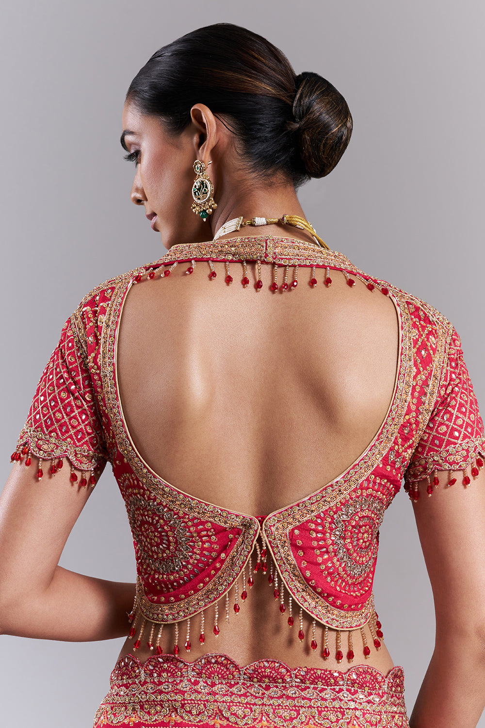 Rani Pink Georgette Embellished Saree And Stitched Blouse