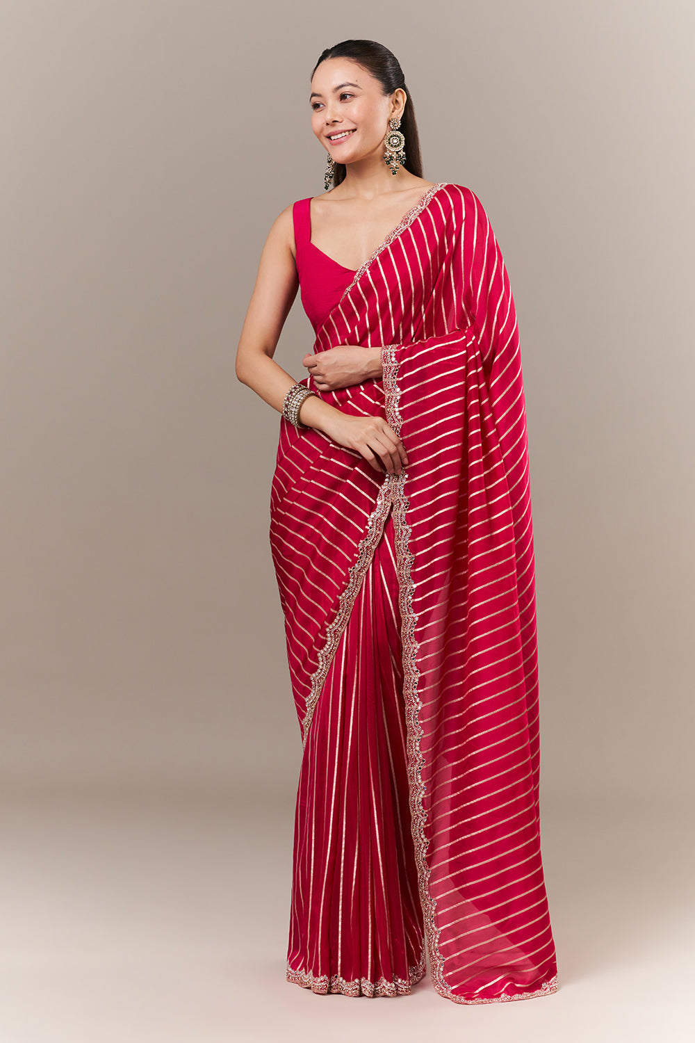 Rani Pink Silk Woven Saree with Mirror and Cutdana Work