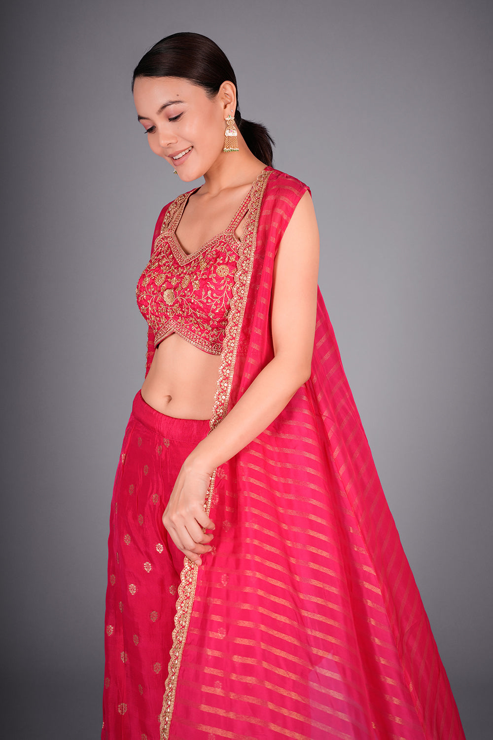 Rani Pink Suit with Embroidered Bustier and Leheriya Cape